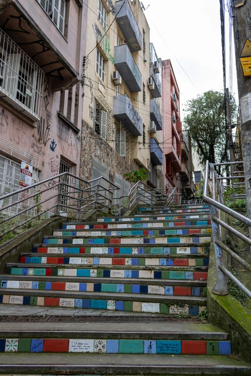 Free Vibrant tiled steps in a graffiti-adorned street, showcasing urban art. Stock Photo