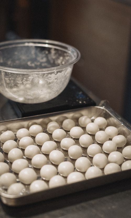 Free Freshly prepared mochi balls ready for cooking in a Shinjuku Tokyo kitchen. Stock Photo