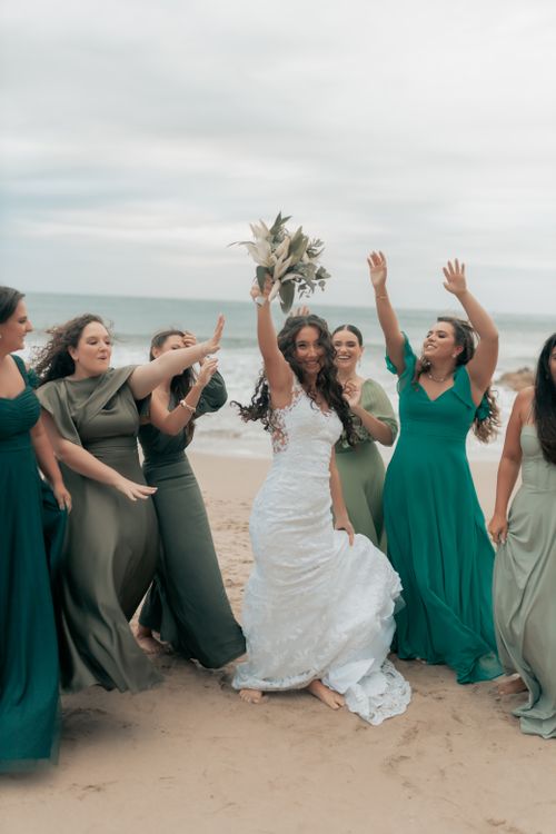 Joyful Beach Wedding Celebration with Bridesmaids Free Stock Photo Joyful Beach Wedding Celebration with Bridesmaids Free Stock Photo