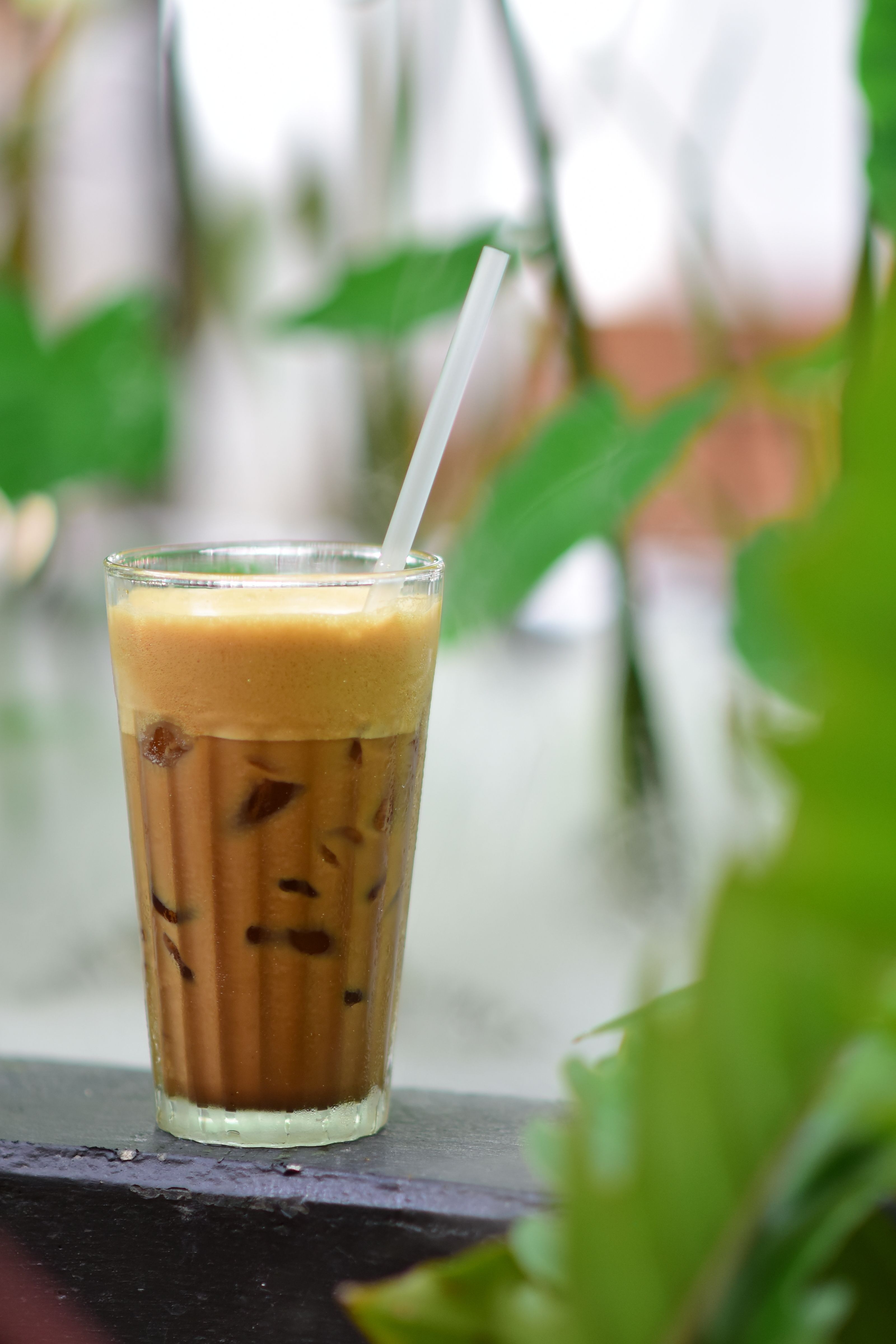 Refreshing Iced Coffee with Creamy Froth · Free Stock Photo