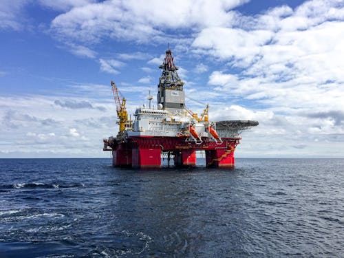 Free Oil Platfrom Rig in the  Middle of the Ocean  Stock Photo