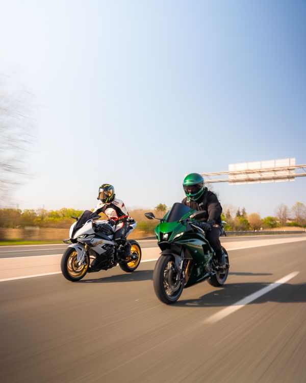 Two People Riding a Motorcycle · Free Stock Photo
