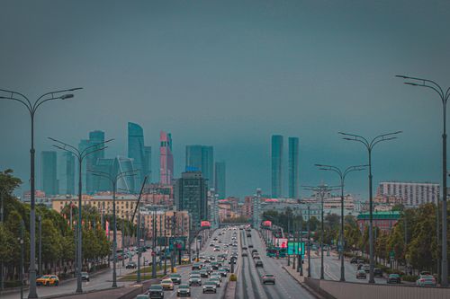 Free Dynamic view of Moscow City skyline with busy urban traffic and skyscrapers at dusk. Stock Photo