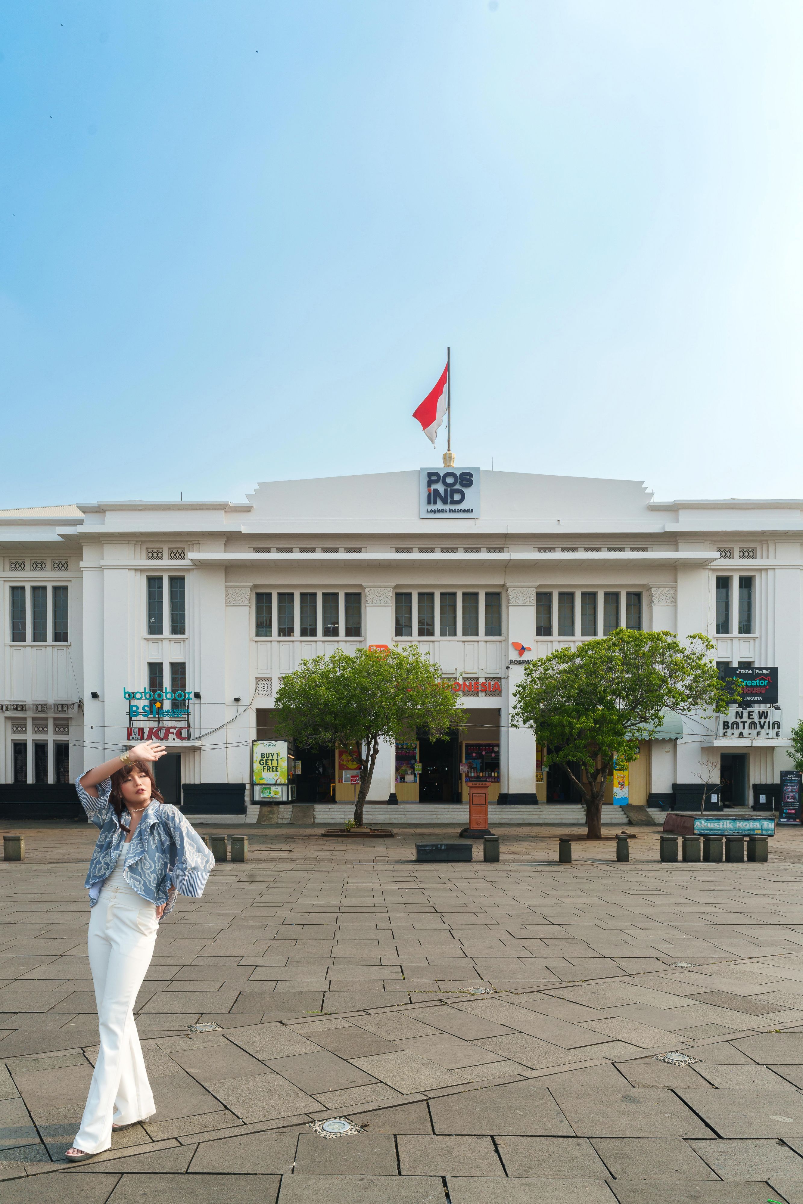 Woman in Front of Historical Post Office in Jakarta