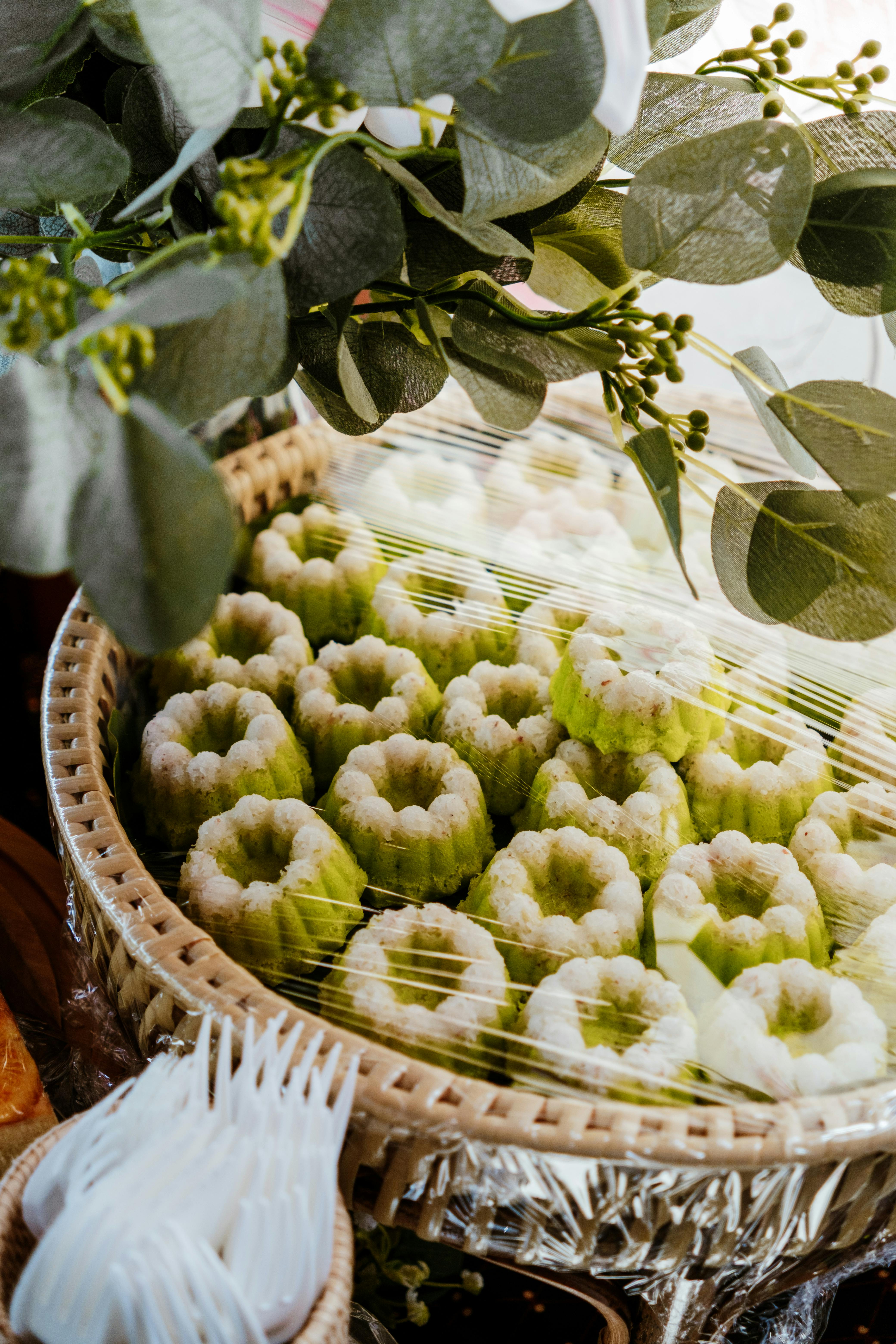 Assorted traditional Peranakan kueh in pastel colours displayed at a shophouse bakery in Joo Chiat Singapore