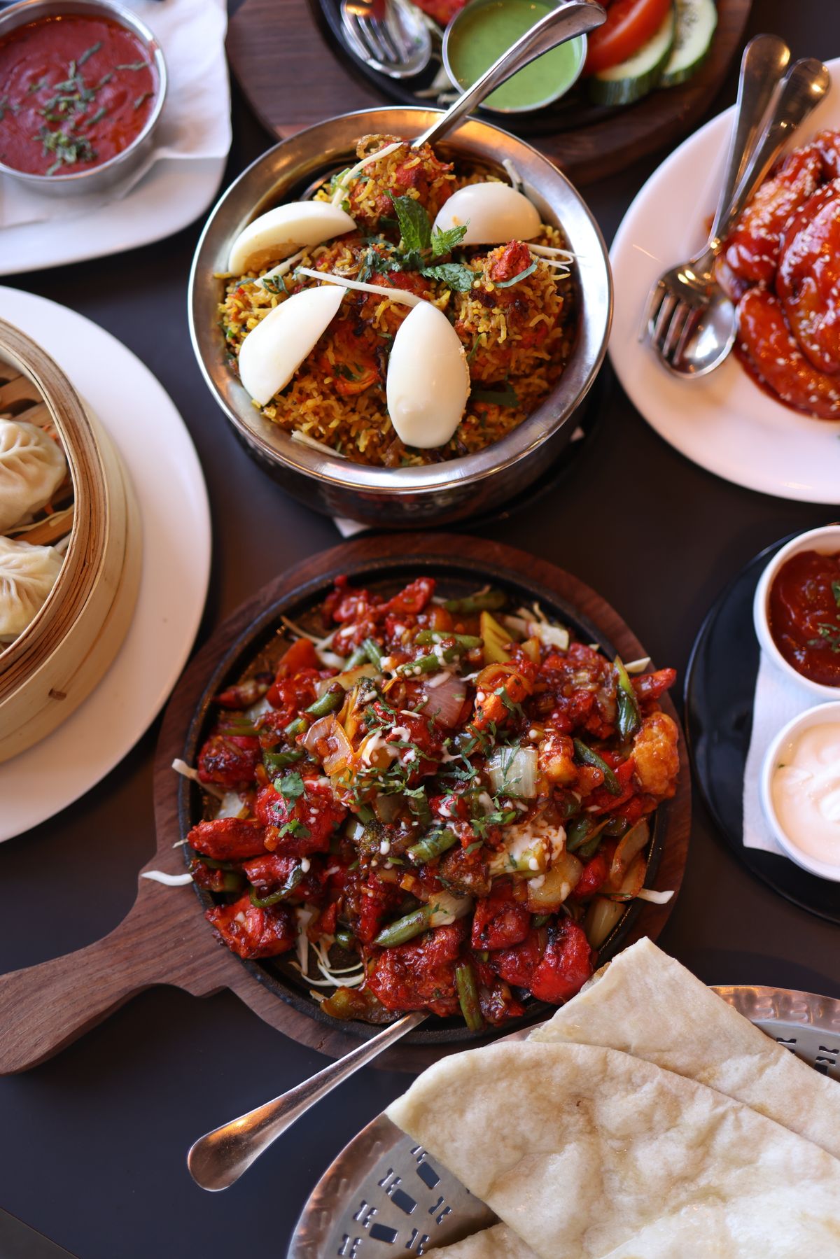 Delicious Indian cuisine platter with biryani and curry