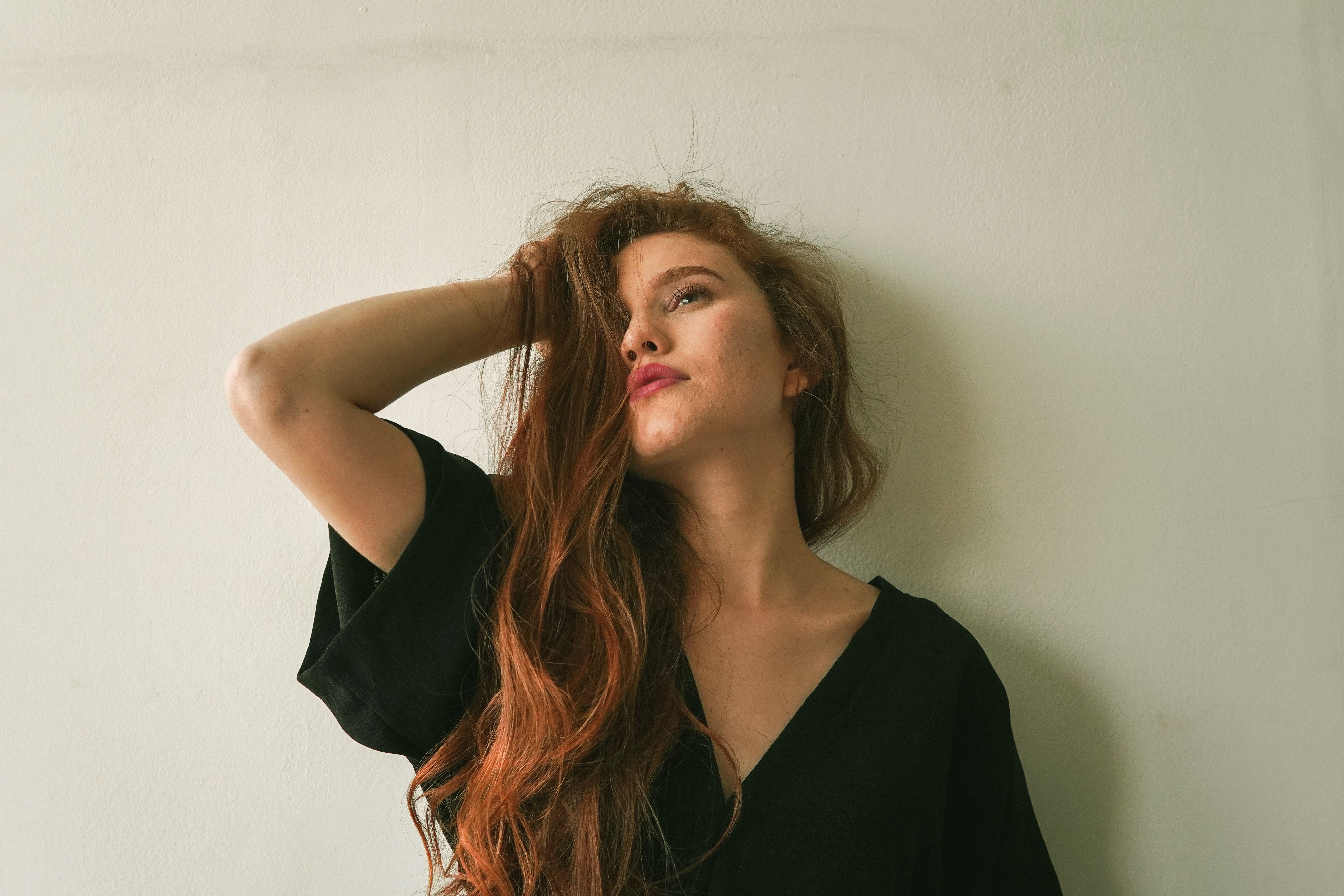 Portrait of Young Woman with Long Red Hair · Free Stock Photo
