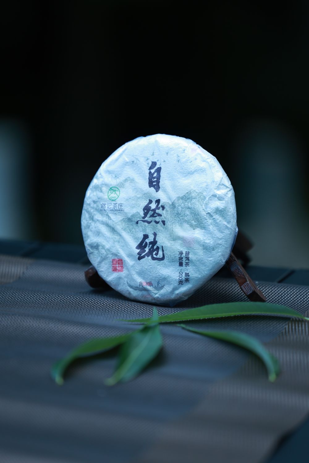 Authentic Chinese Pu-erh Tea Cake on Display · Free Stock Photo
