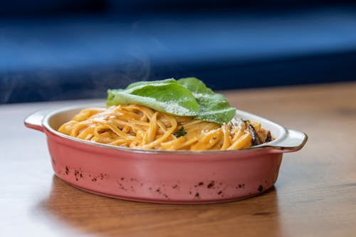 Free Pasta With Basil Leaves on Top  Stock Photo
