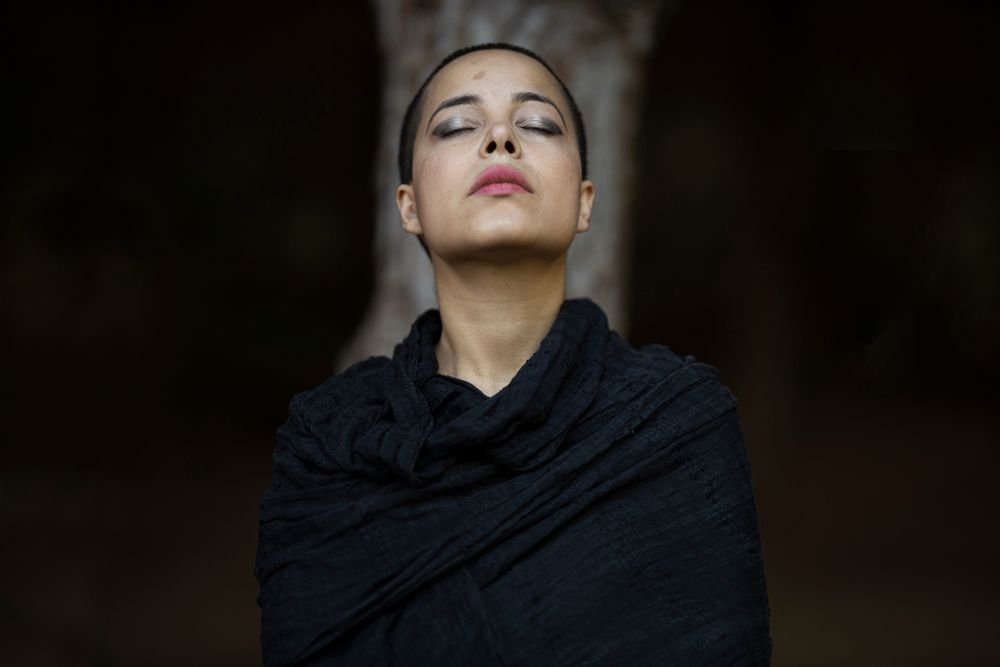 Close portrait of a practitioner mid-breath — photo by Engin Akyurt on Pexels