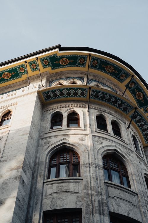 Free Detail of Ottoman architectural design in İstanbul, highlighting decorative arches and windows. Stock Photo