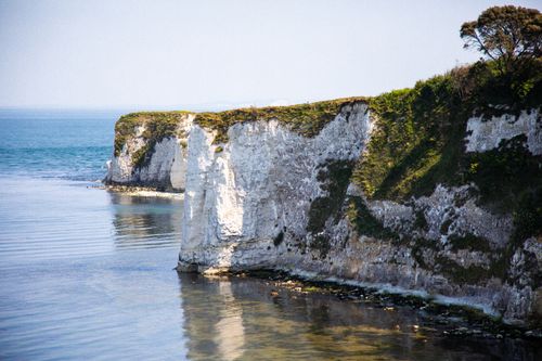 Free Stunning view of the iconic white chalk cliffs of Old Harry Rocks on the Dorset coast in England. Stock Photo