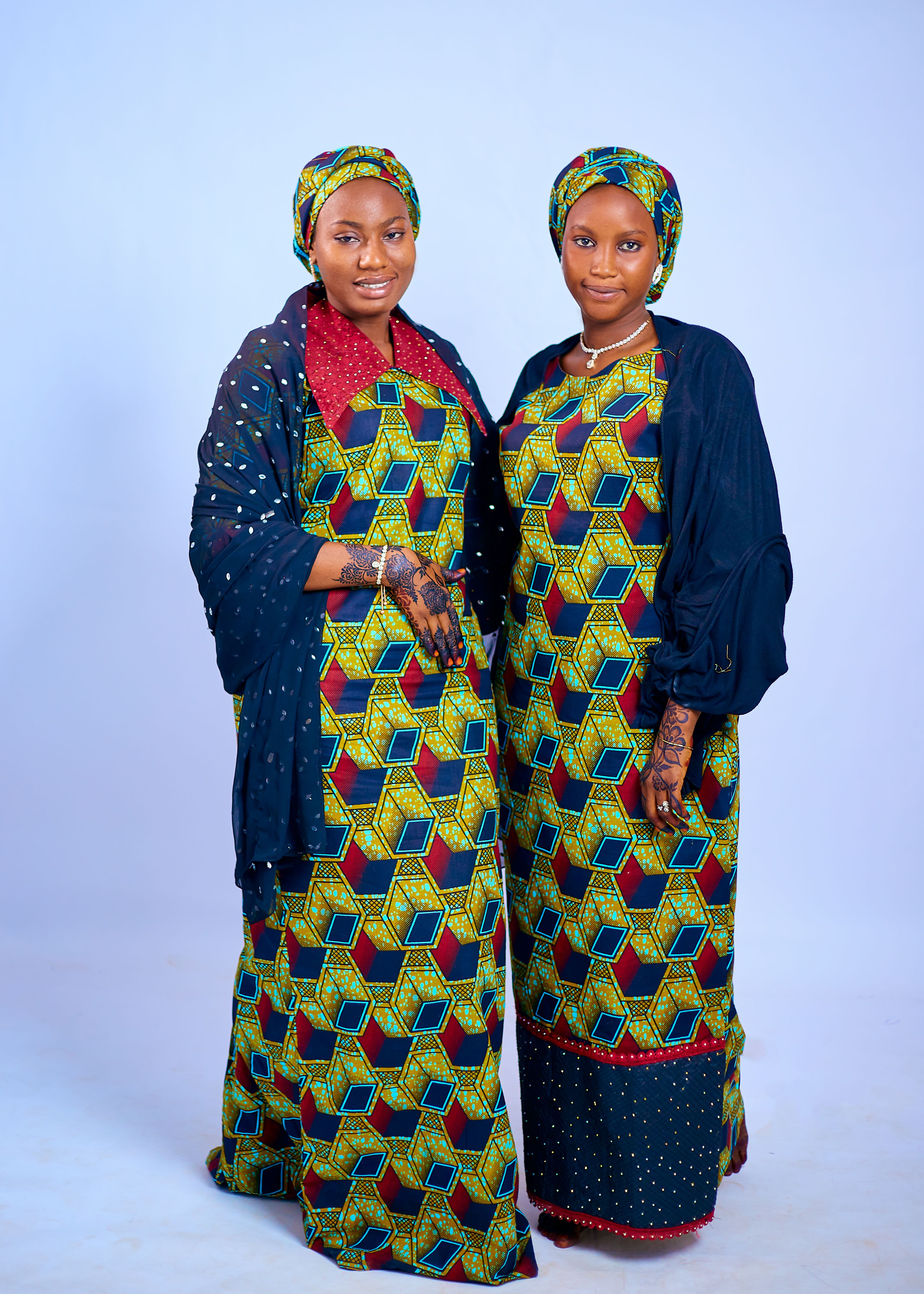 Two Women in Vibrant Traditional African Dresses · Free Stock Photo