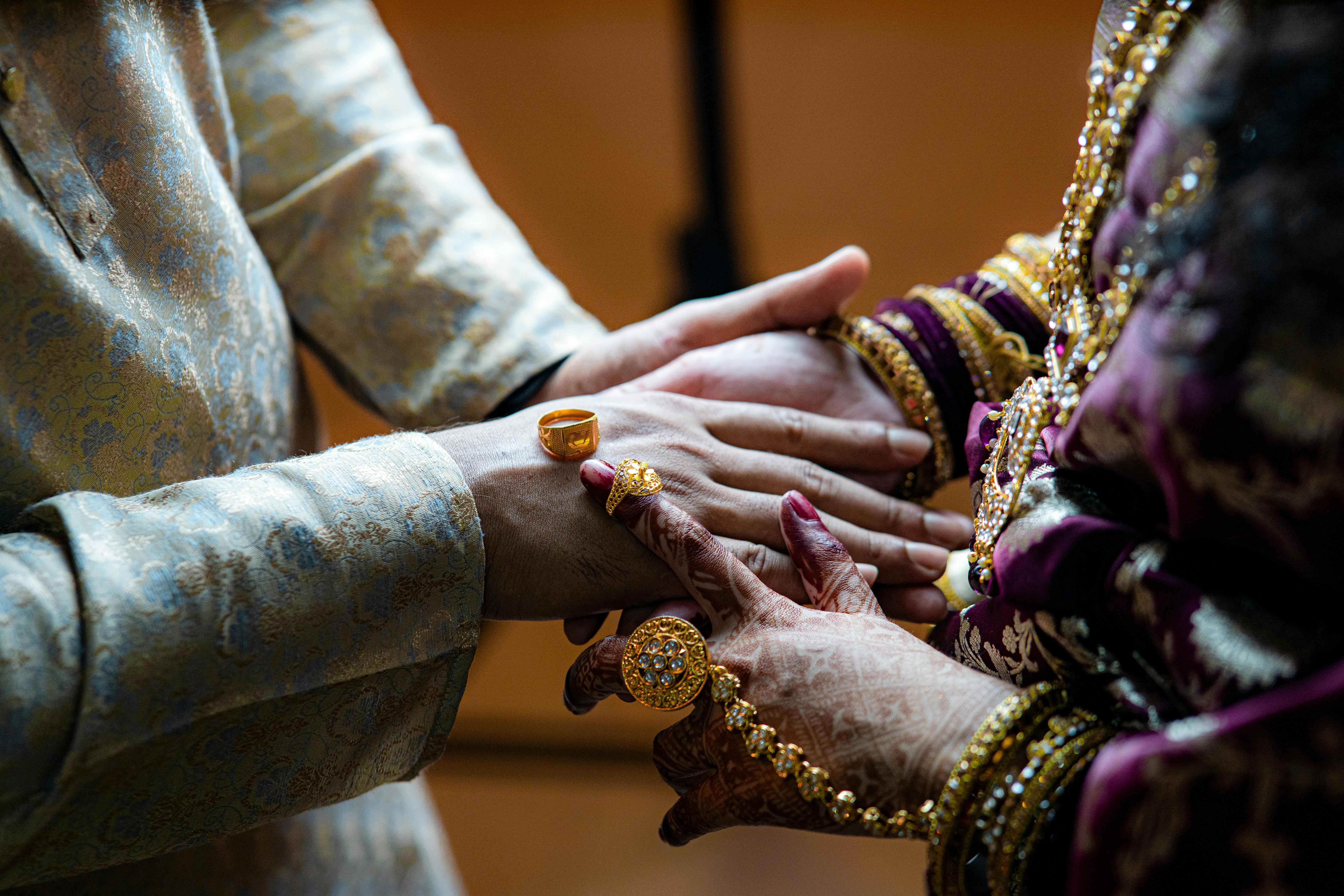 https://www.pexels.com/photo/elegant-indian-wedding-ceremony-ring-exchange-32095707/