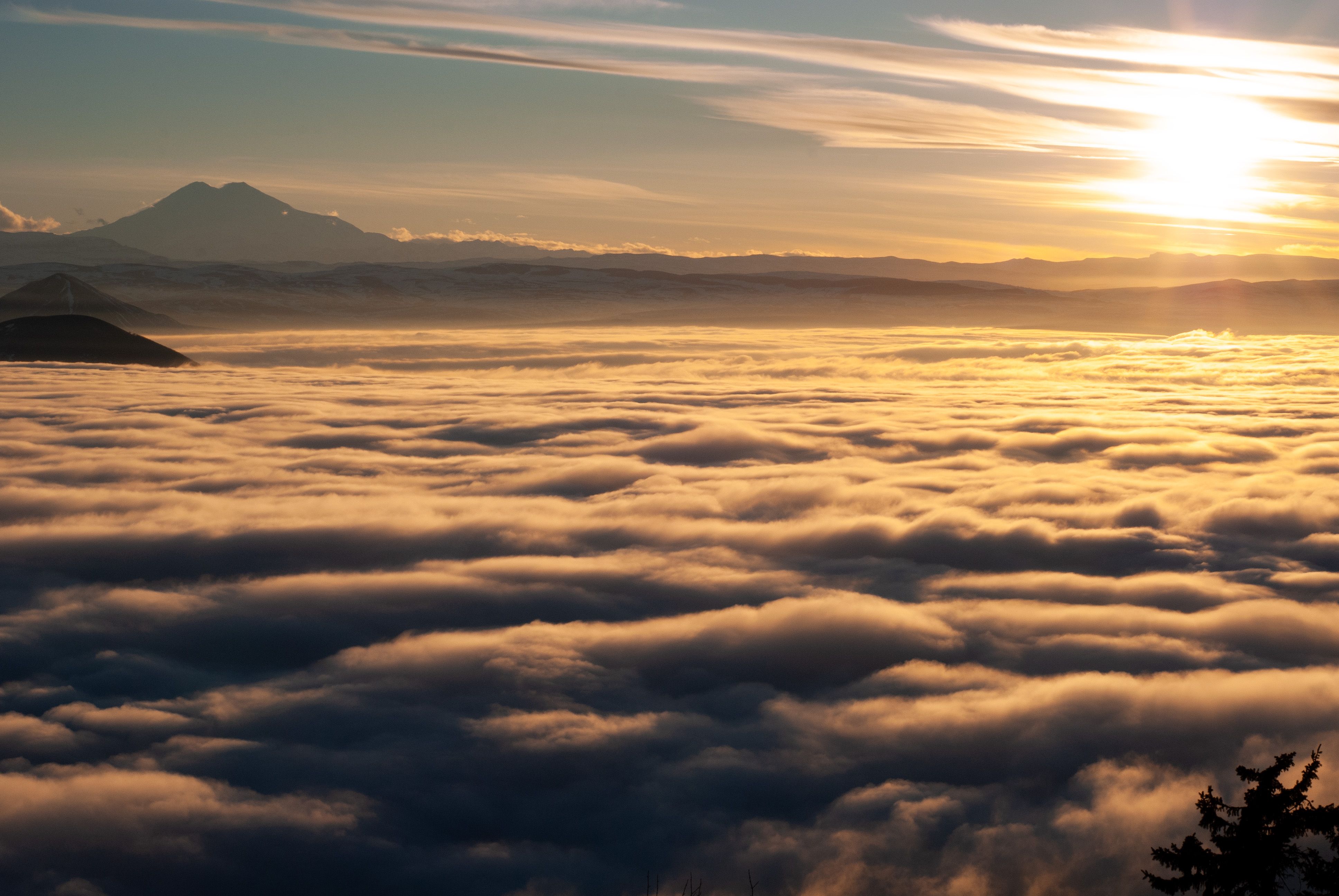 Cascade Volcanoes Shrouded in Smoke
