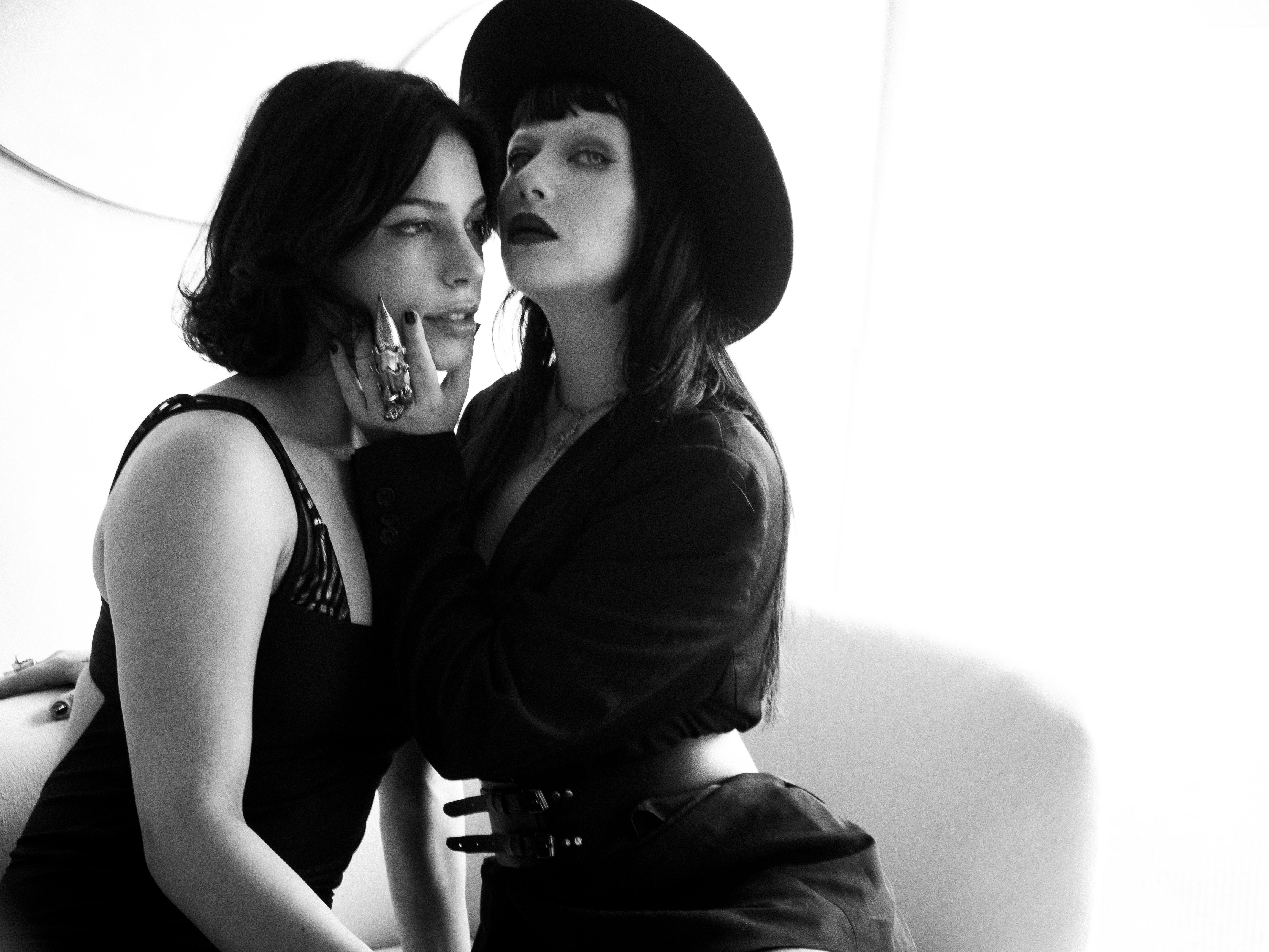 Black Clothing On A Model In A Dramatic, Mysterious Setting, Emphasizing Sophistication And Depth