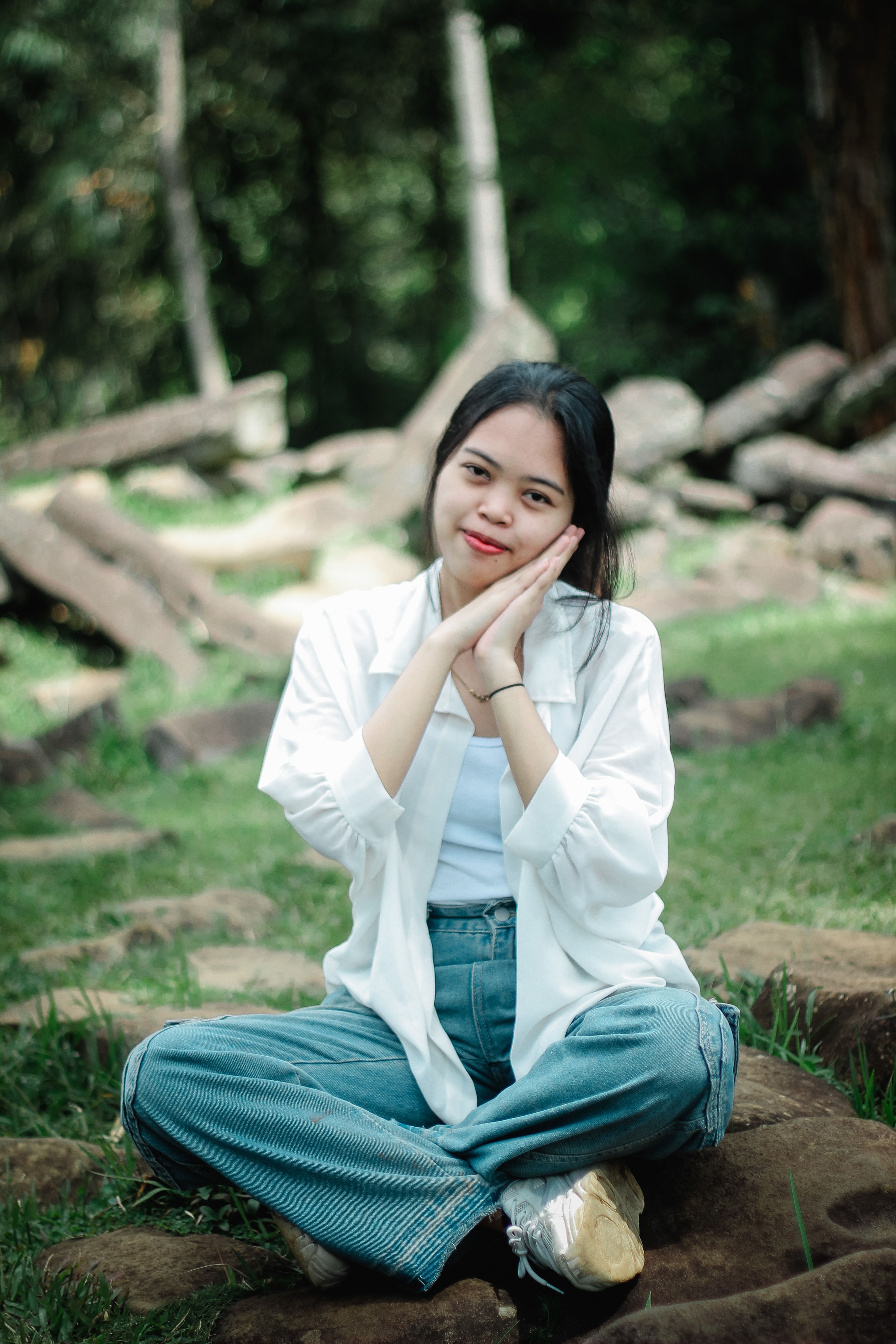 Young Woman Relaxing Outdoors in Nature · Free Stock Photo