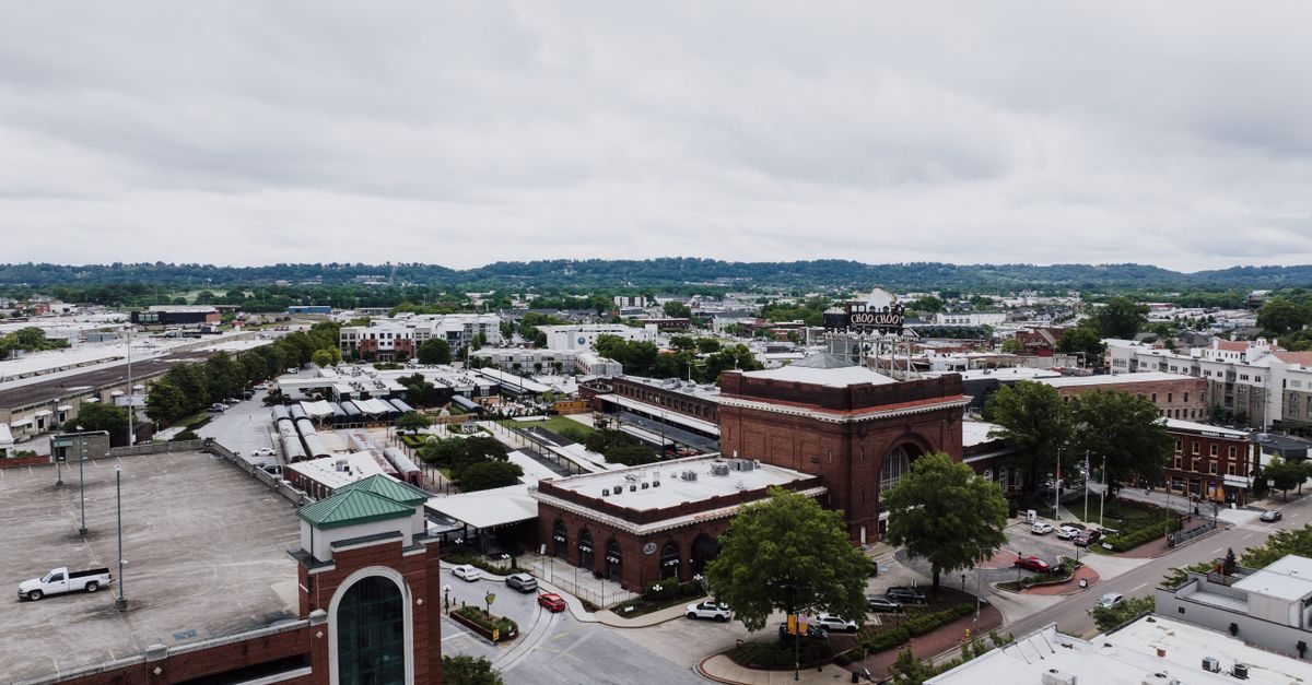 Aerial view of the historic Choo Choo Terminal in Chattanooga, showcasing urban architecture and surrounding cityscape.