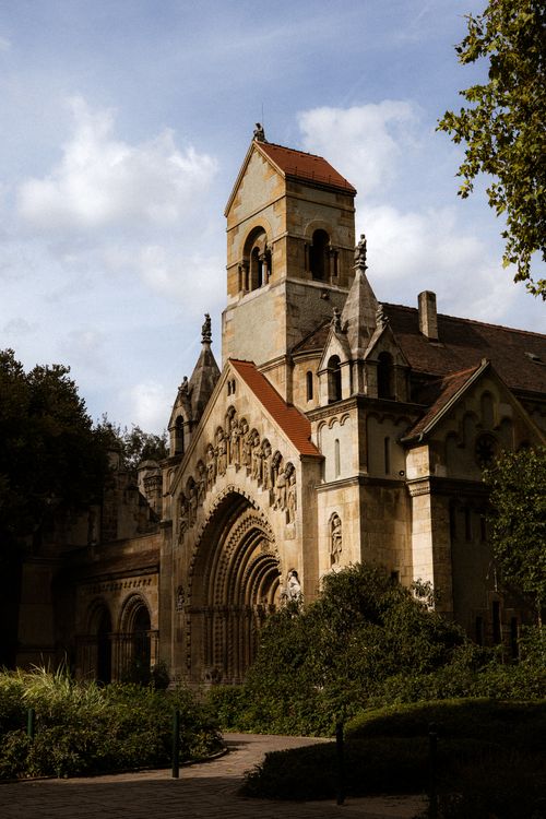Free Medieval architecture of Vajdahunyad Castle in Budapest, Hungary, under a cloudy sky. Stock Photo