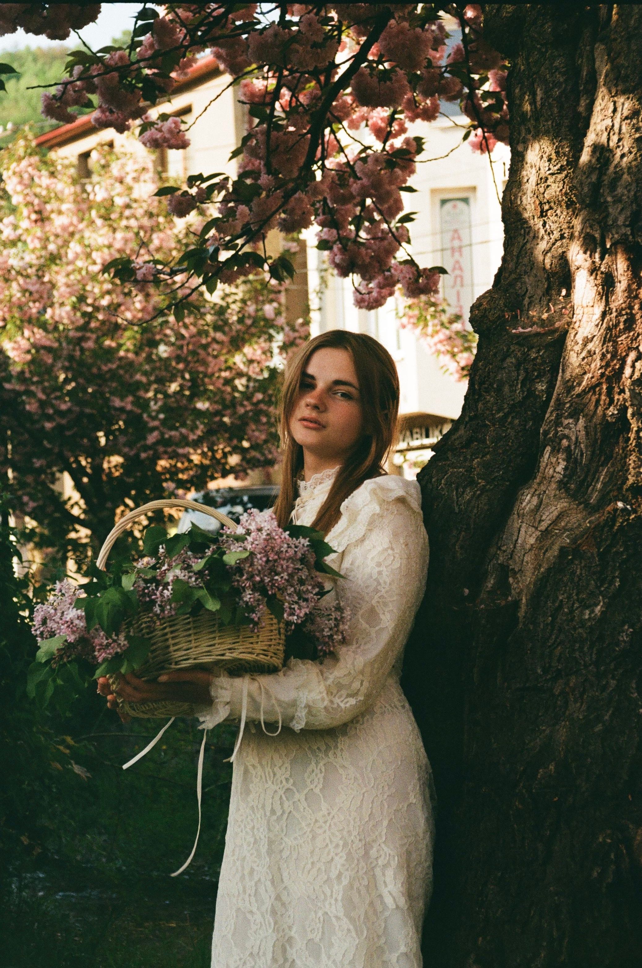 Lace dress among spring blossoms