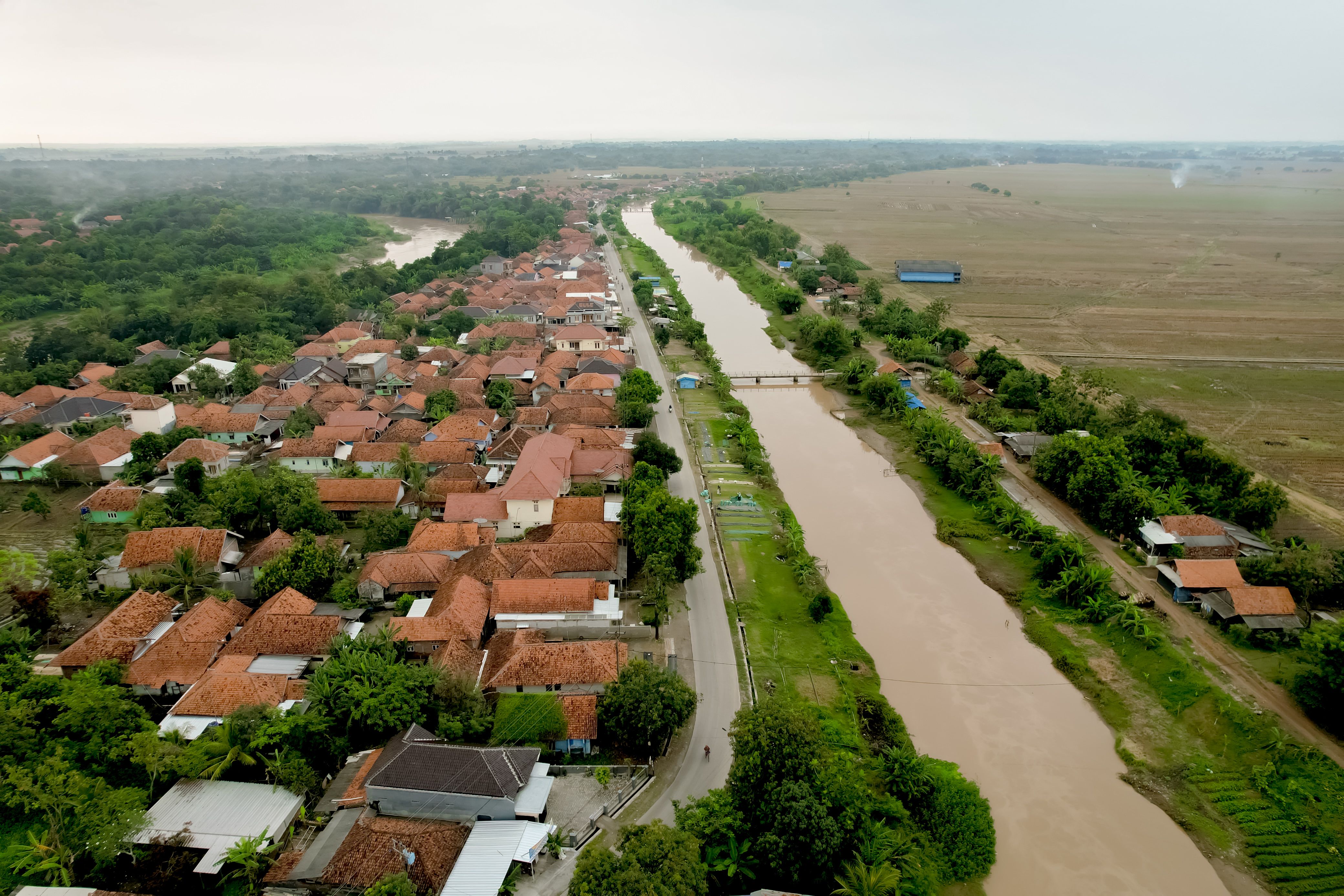 Aerial View of Rural Village and River Landscape · Free Stock Photo