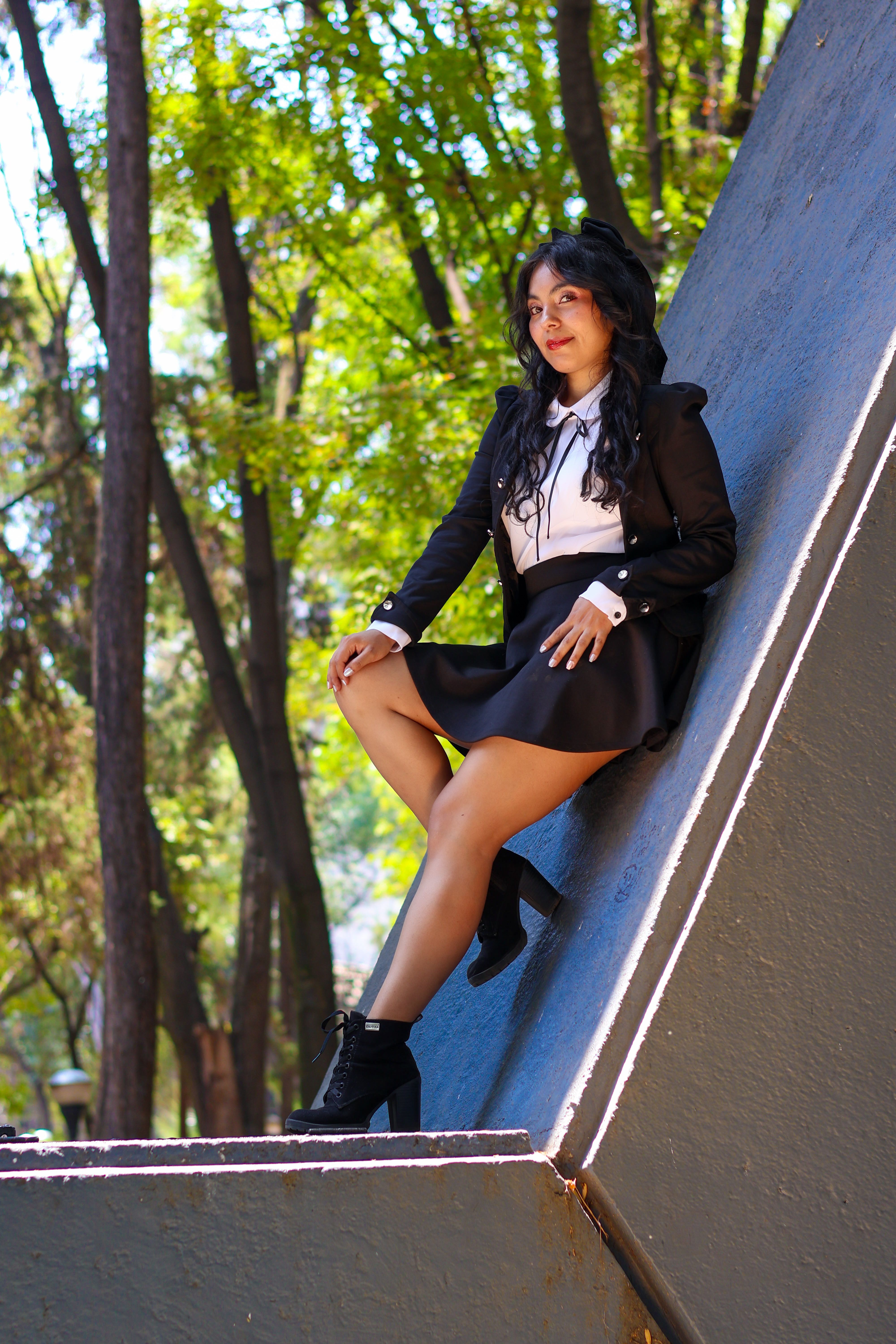 Fashionable Woman Posing in Outdoor Setting · Free Stock Photo