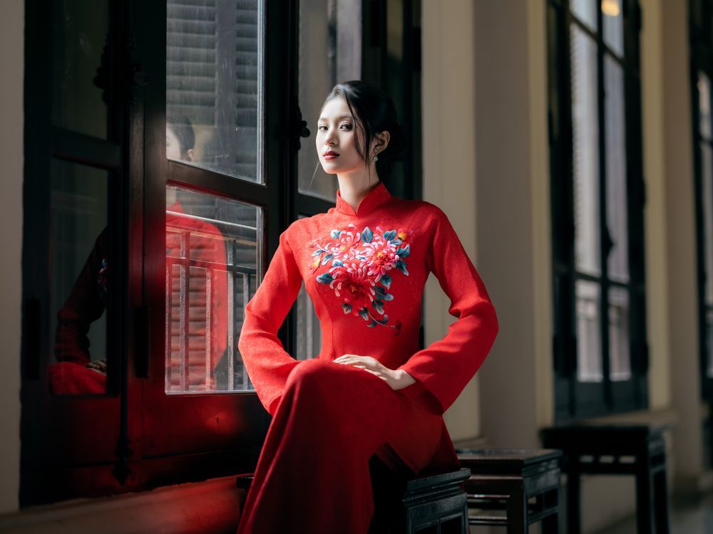 Elegant Woman in Red Dress by Window Indoors · Free Stock Photo