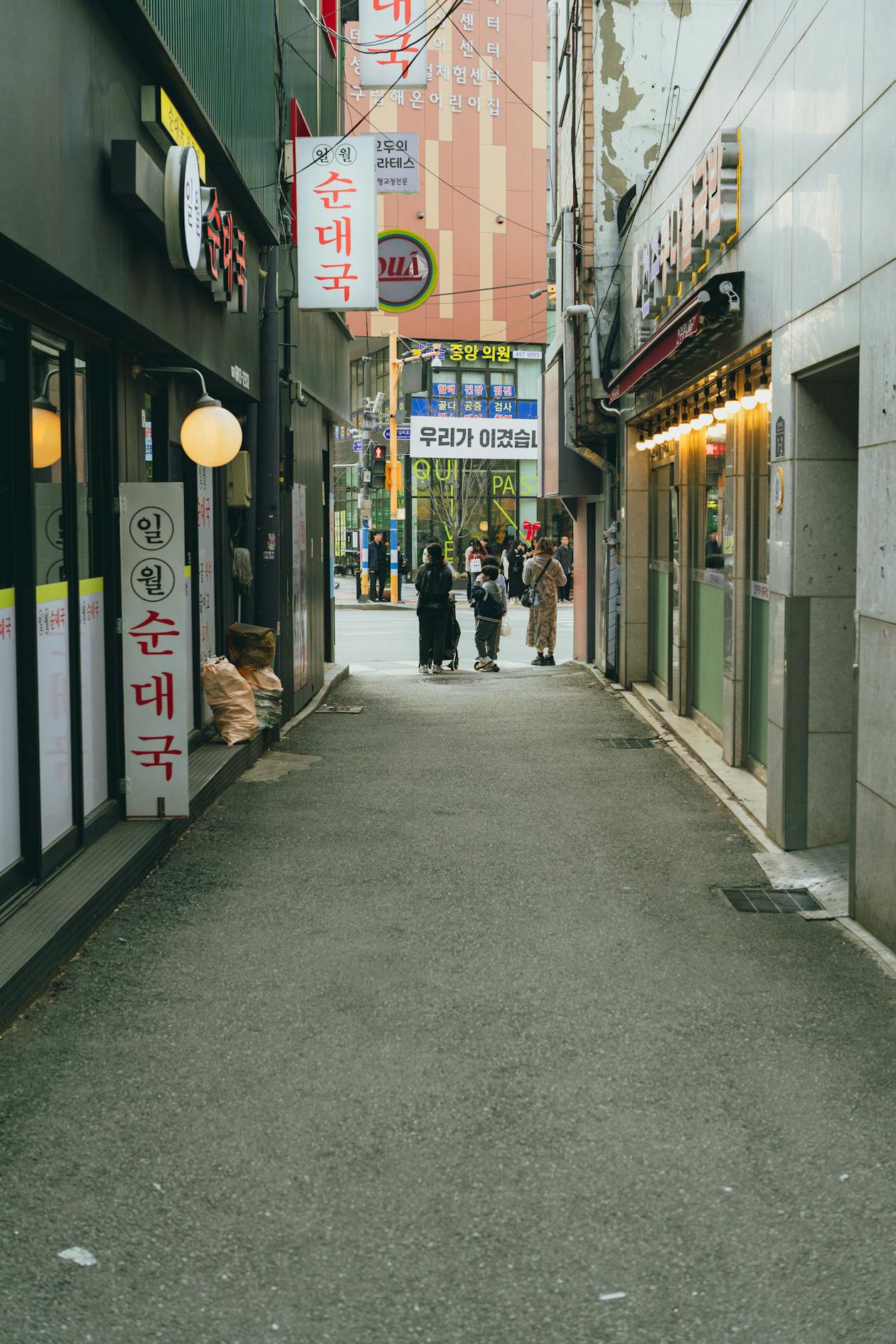 Charming street scene in a trendy Seoul neighborhood with cafes and shops