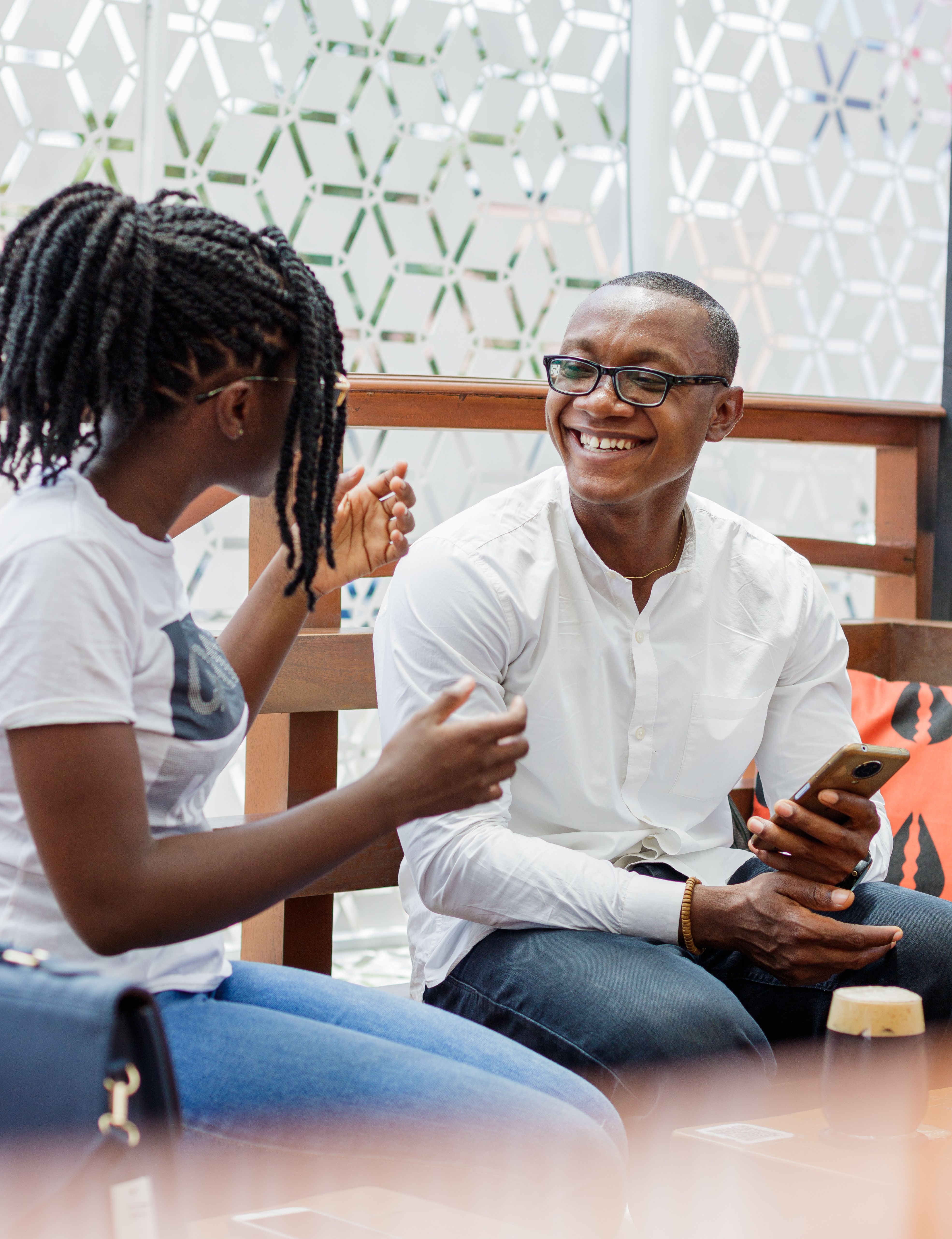Couple having conversation over coffee in modern dating context