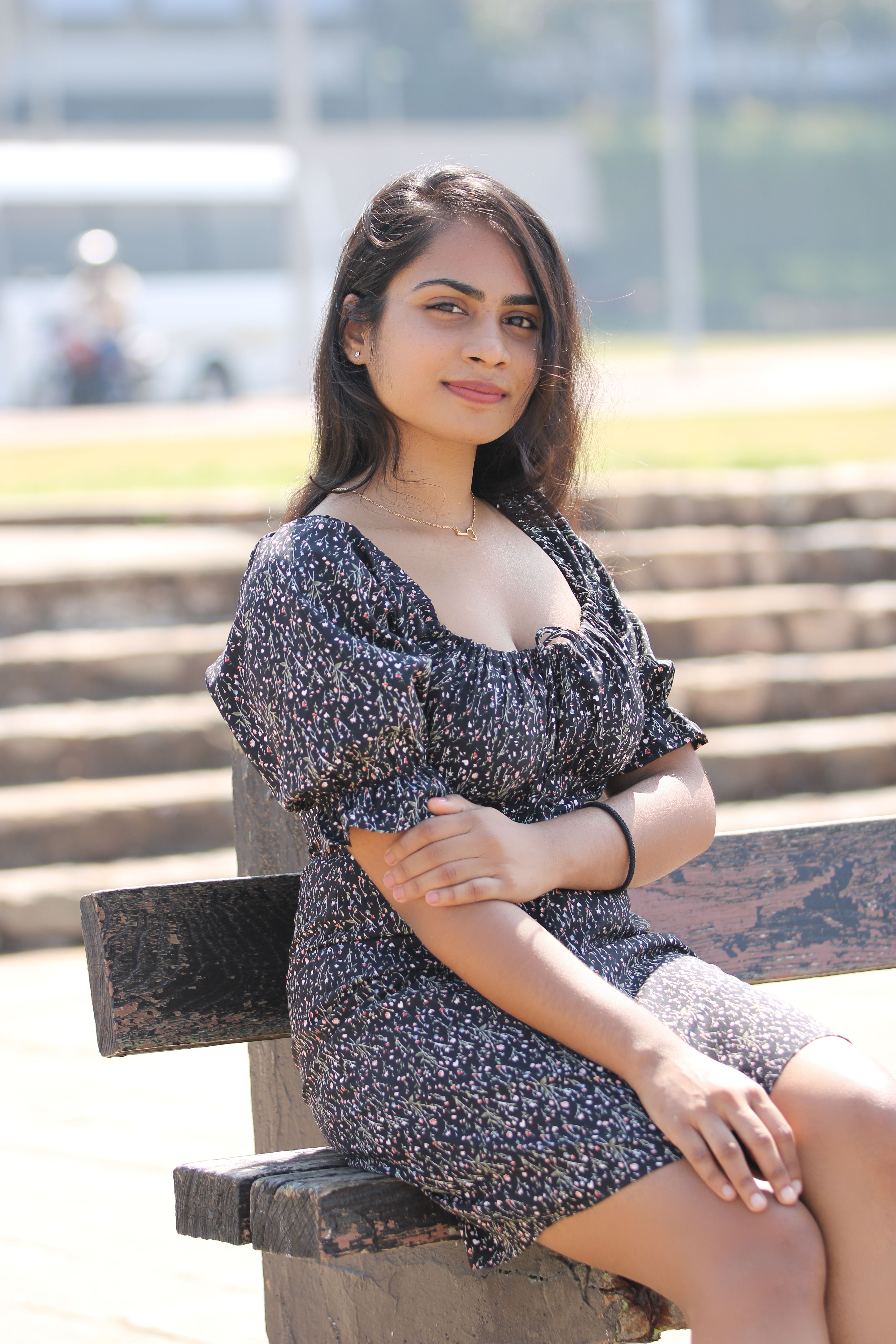 Portrait of a Woman with Long Black Hair in a Floral Dress · Free Stock ...