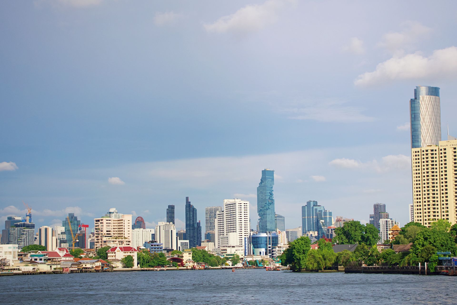 Panoramic view of Bangkok skyline by the river