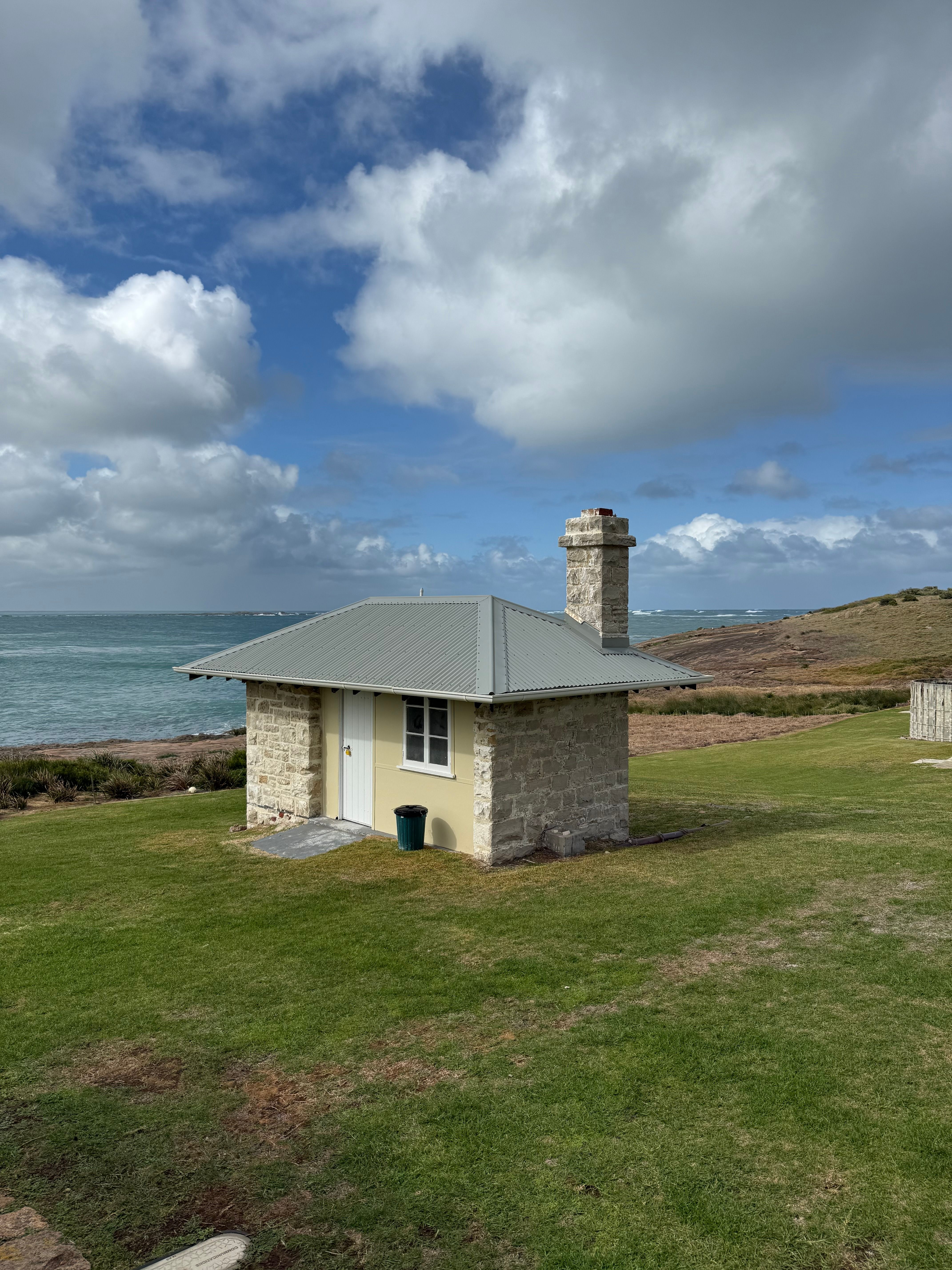 Charming Coastal Stone Cottage with Ocean View · Free Stock Photo