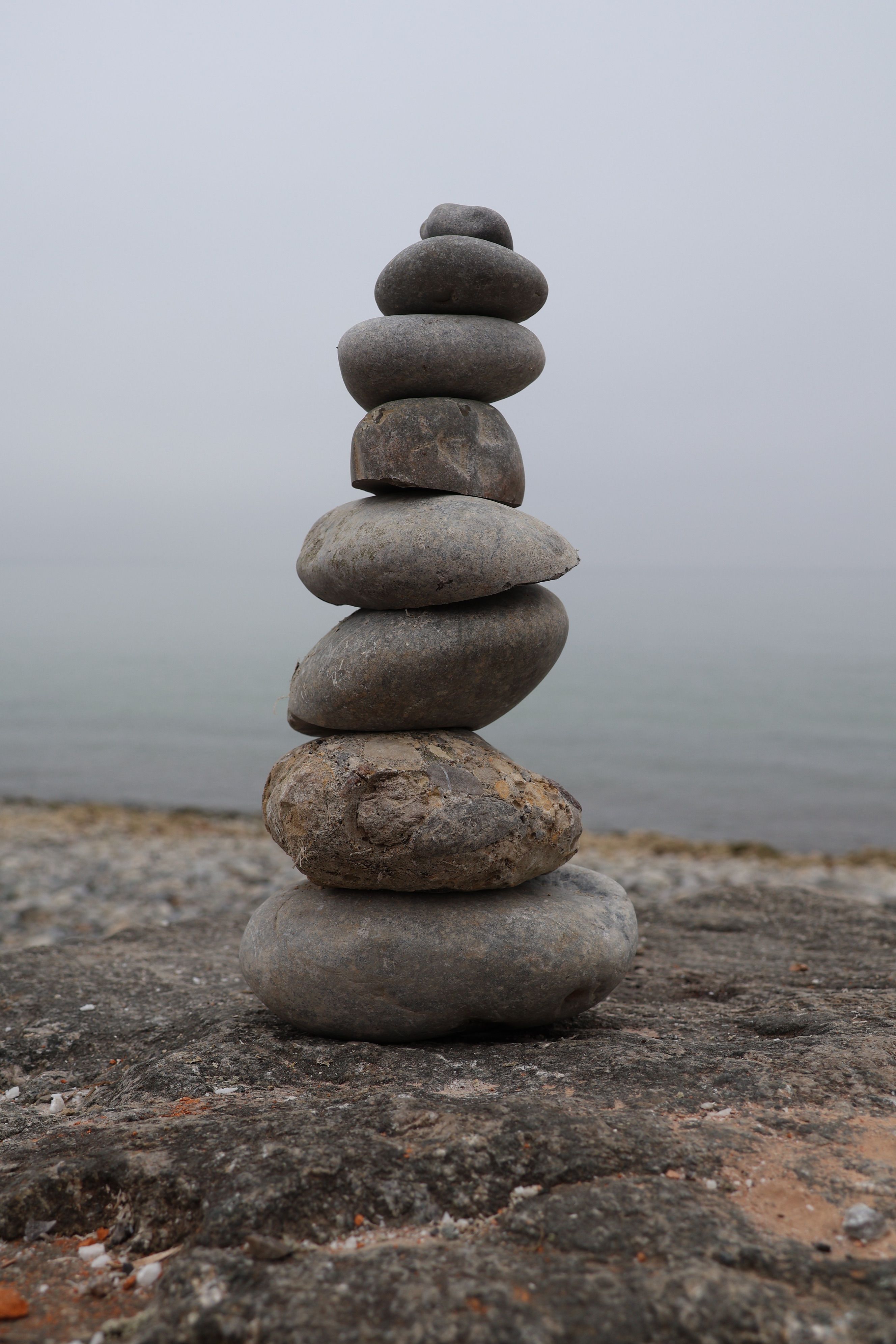 Balanced Stone Stack by Tranquil Beachside · Free Stock Photo