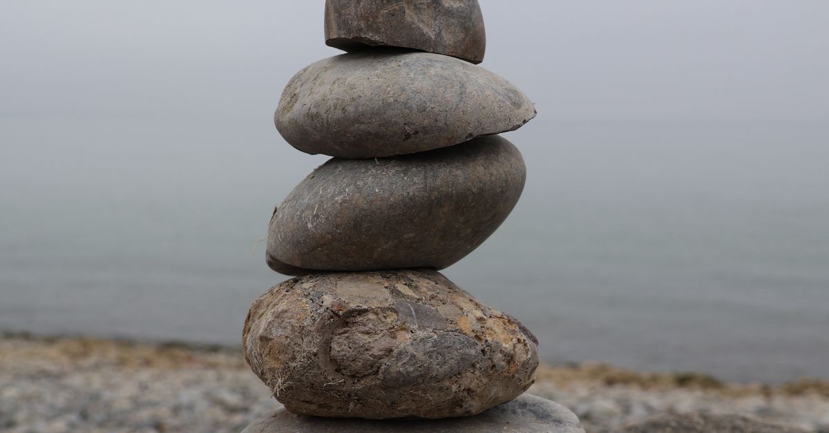 Balanced Stone Stack by Tranquil Beachside · Free Stock Photo
