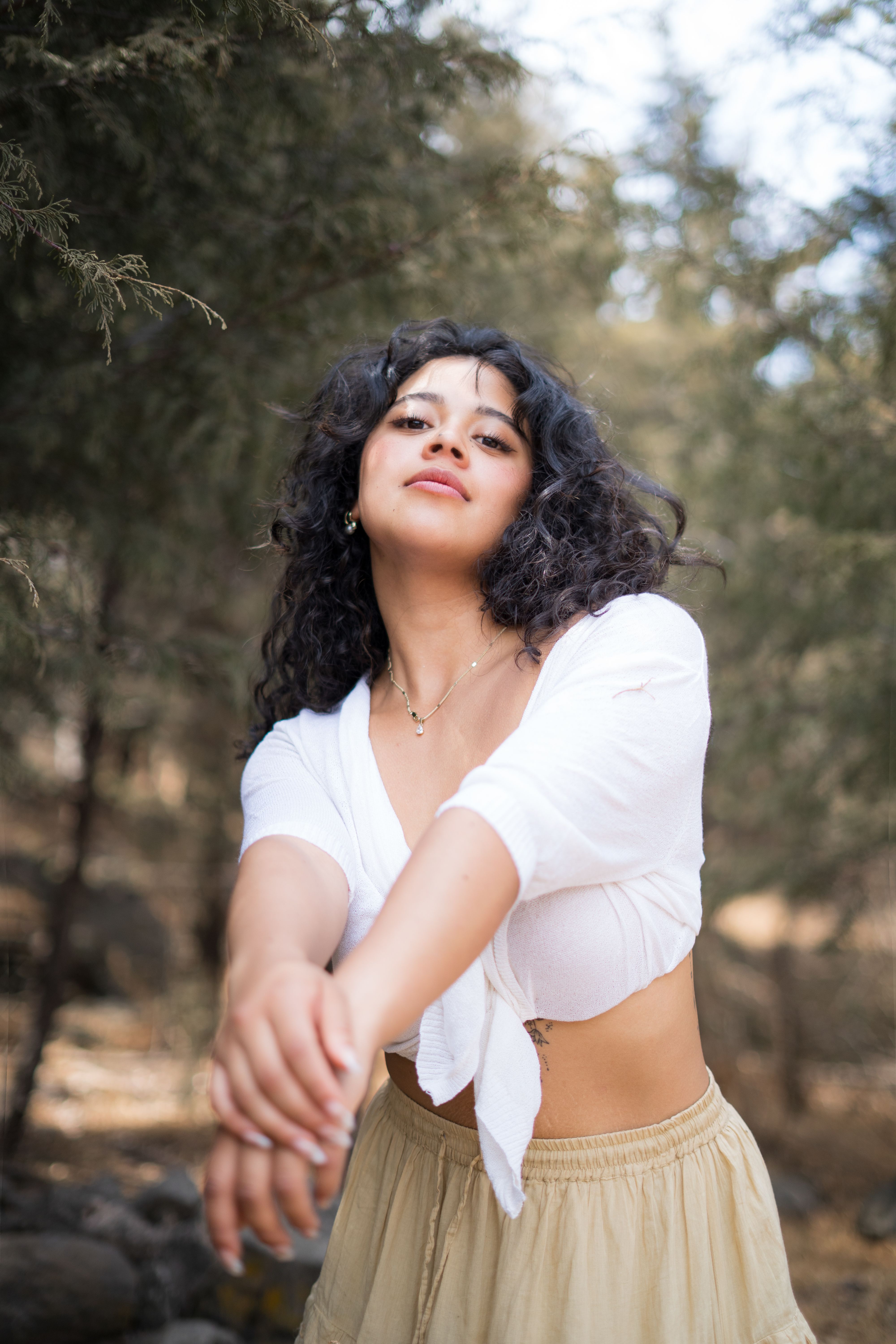 Young Woman Posing Outdoors in Nature · Free Stock Photo