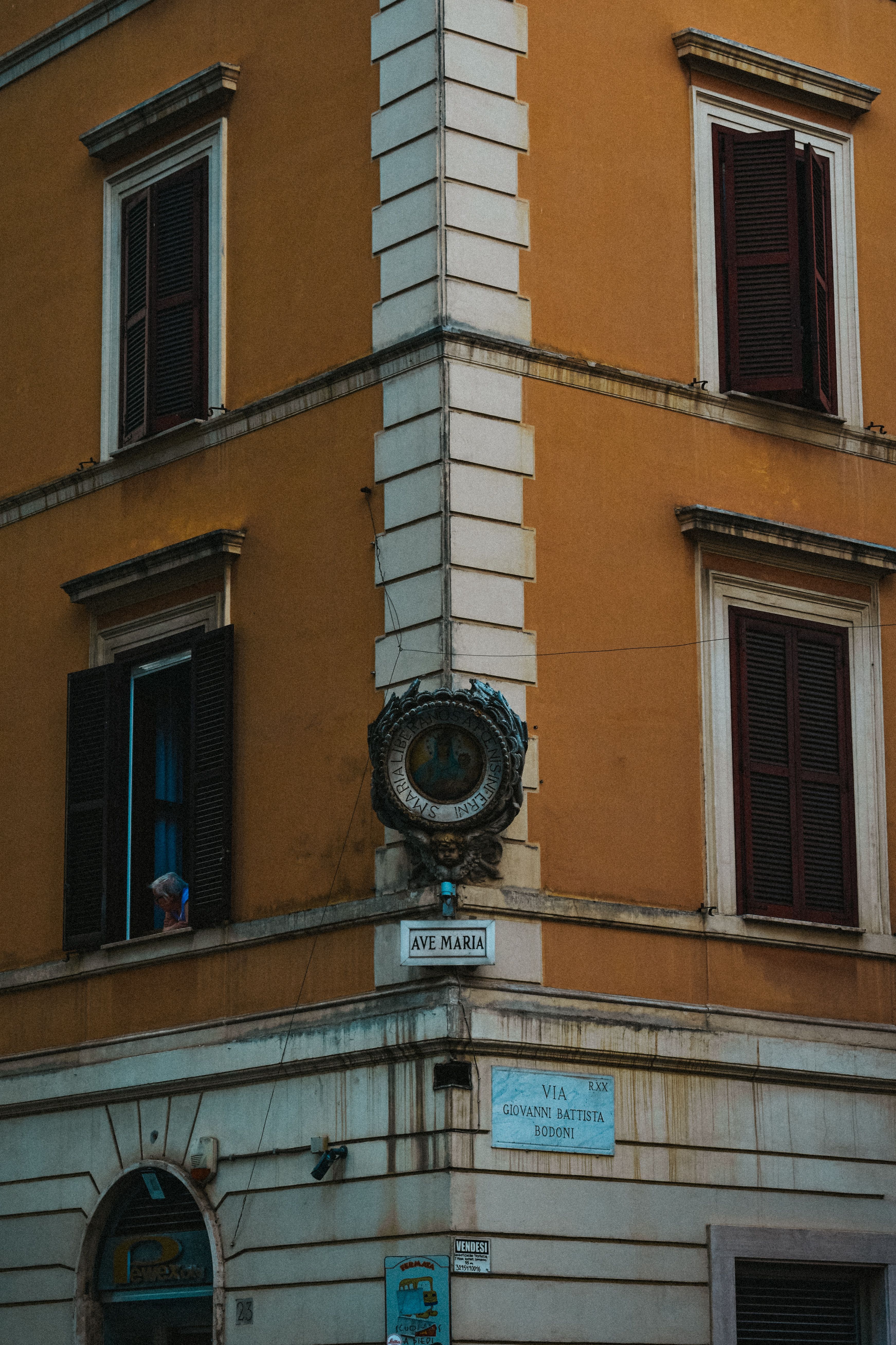 Historic Roman Building Corner with Vintage Clock · Free Stock Photo