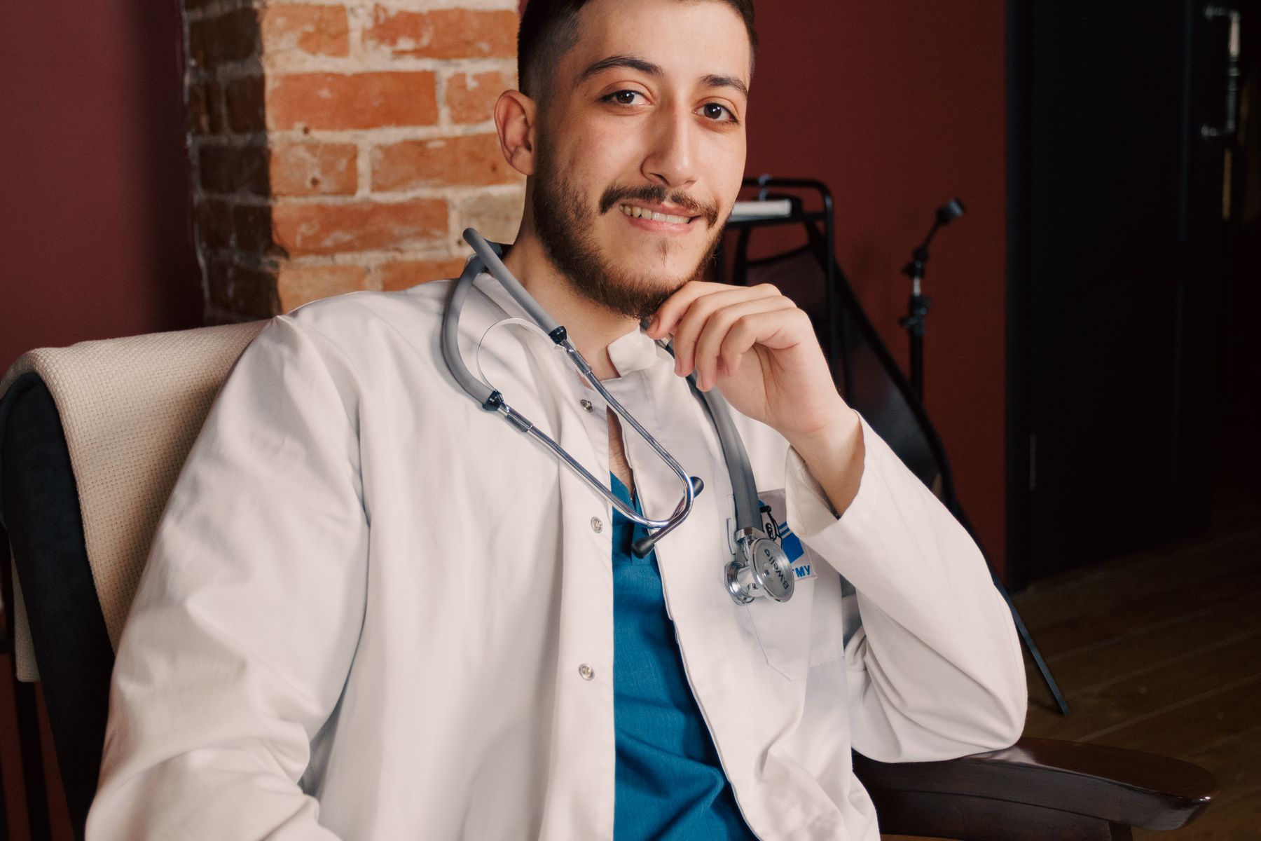 Smiling physician in a modern private clinic environment