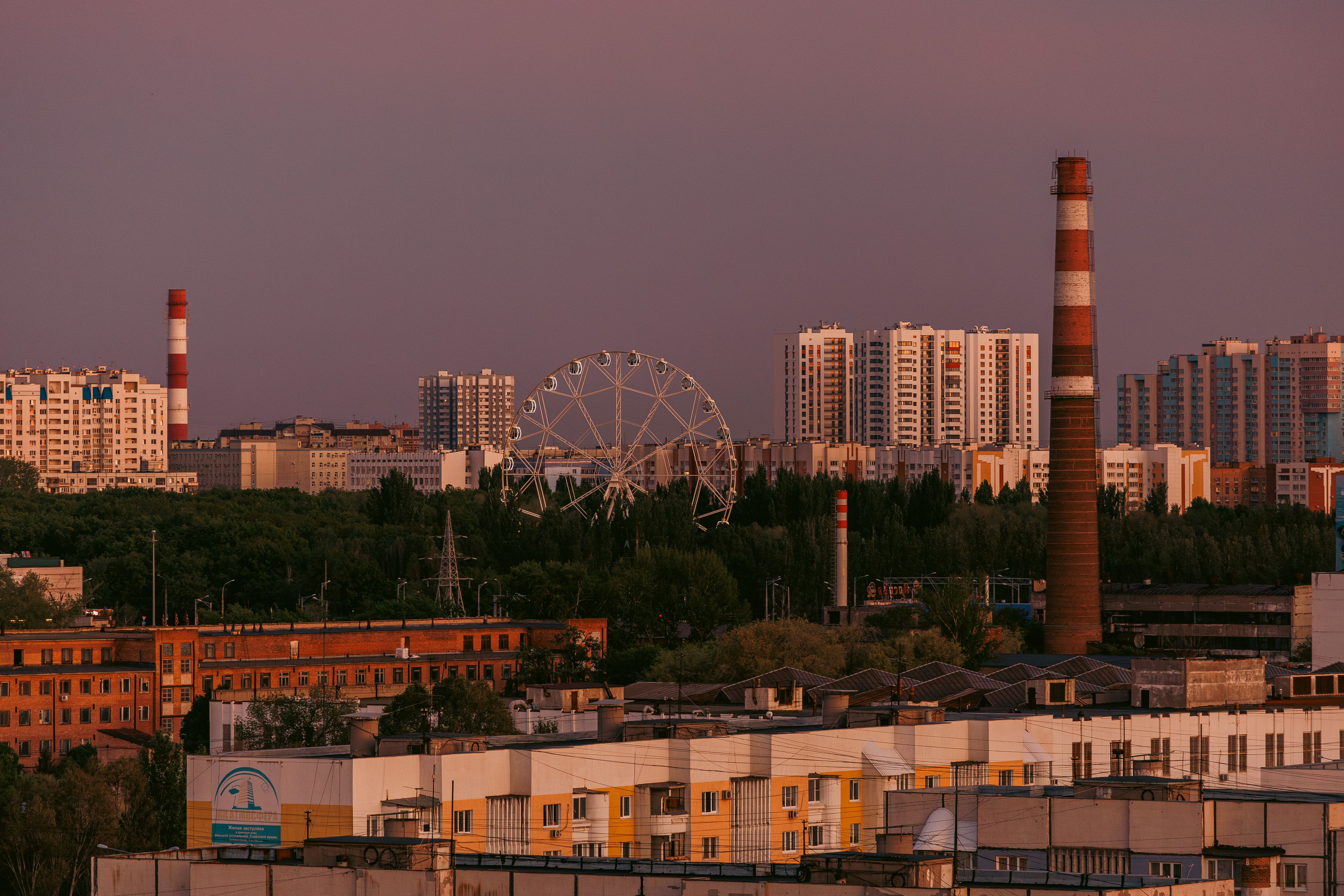 City Skyline at Sunset with Ferris Wheel · Free Stock Photo