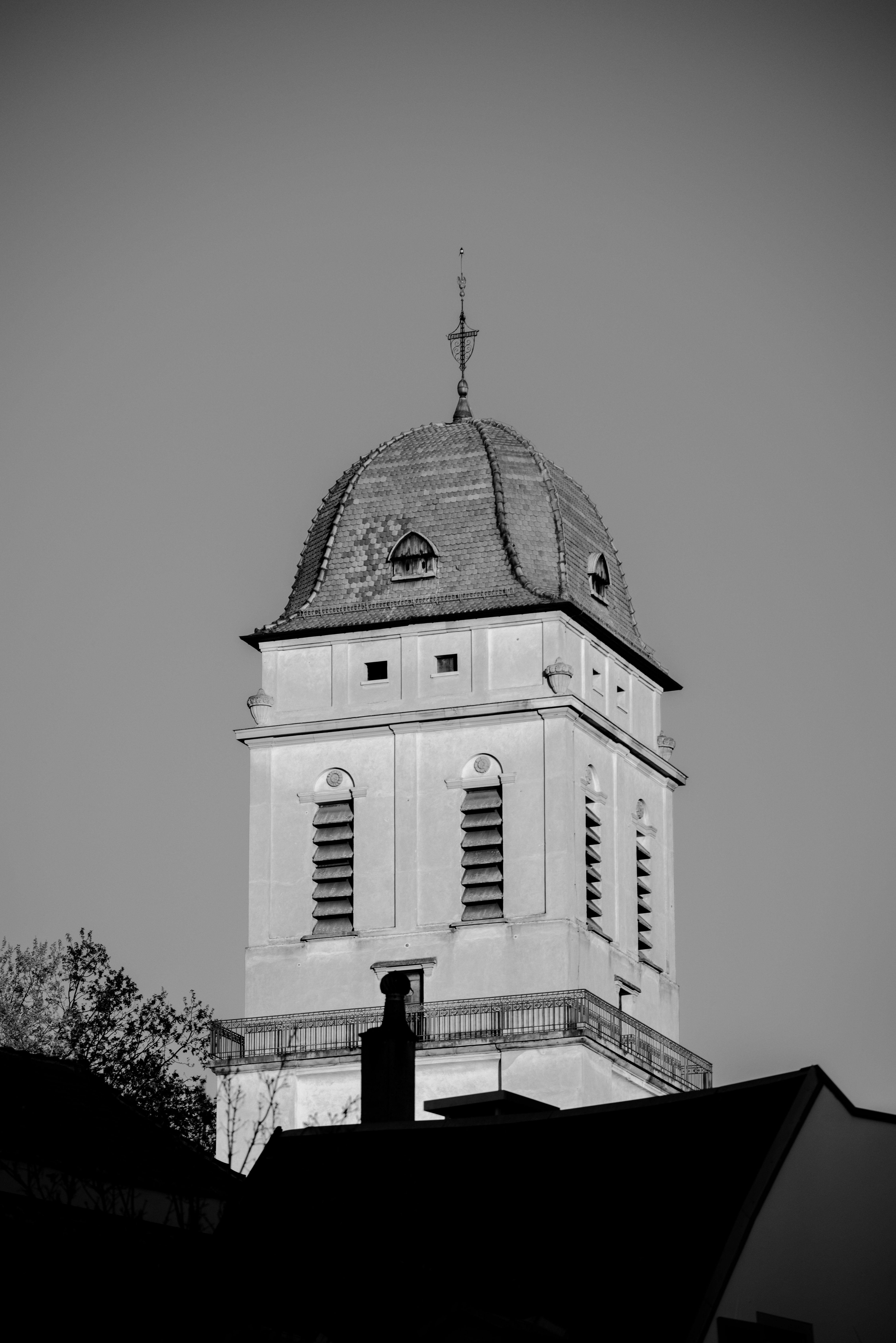Elegant black and white photo of a tower in Strasbourg, showcasing architectural beauty.