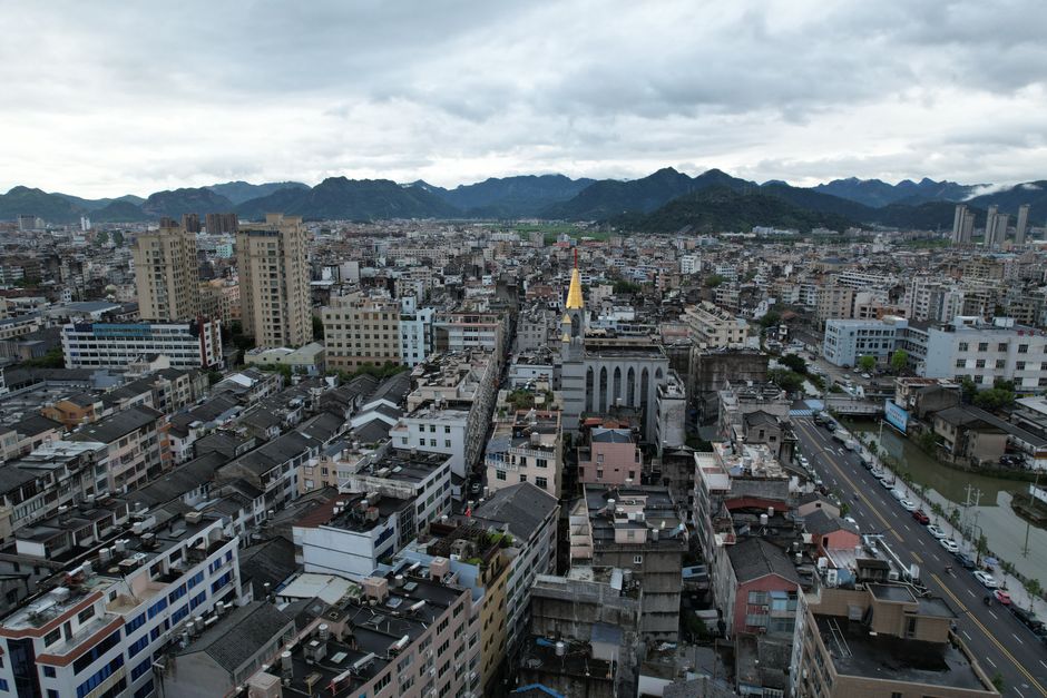 Taizhou - Vibrant city street with local shops and cafes
