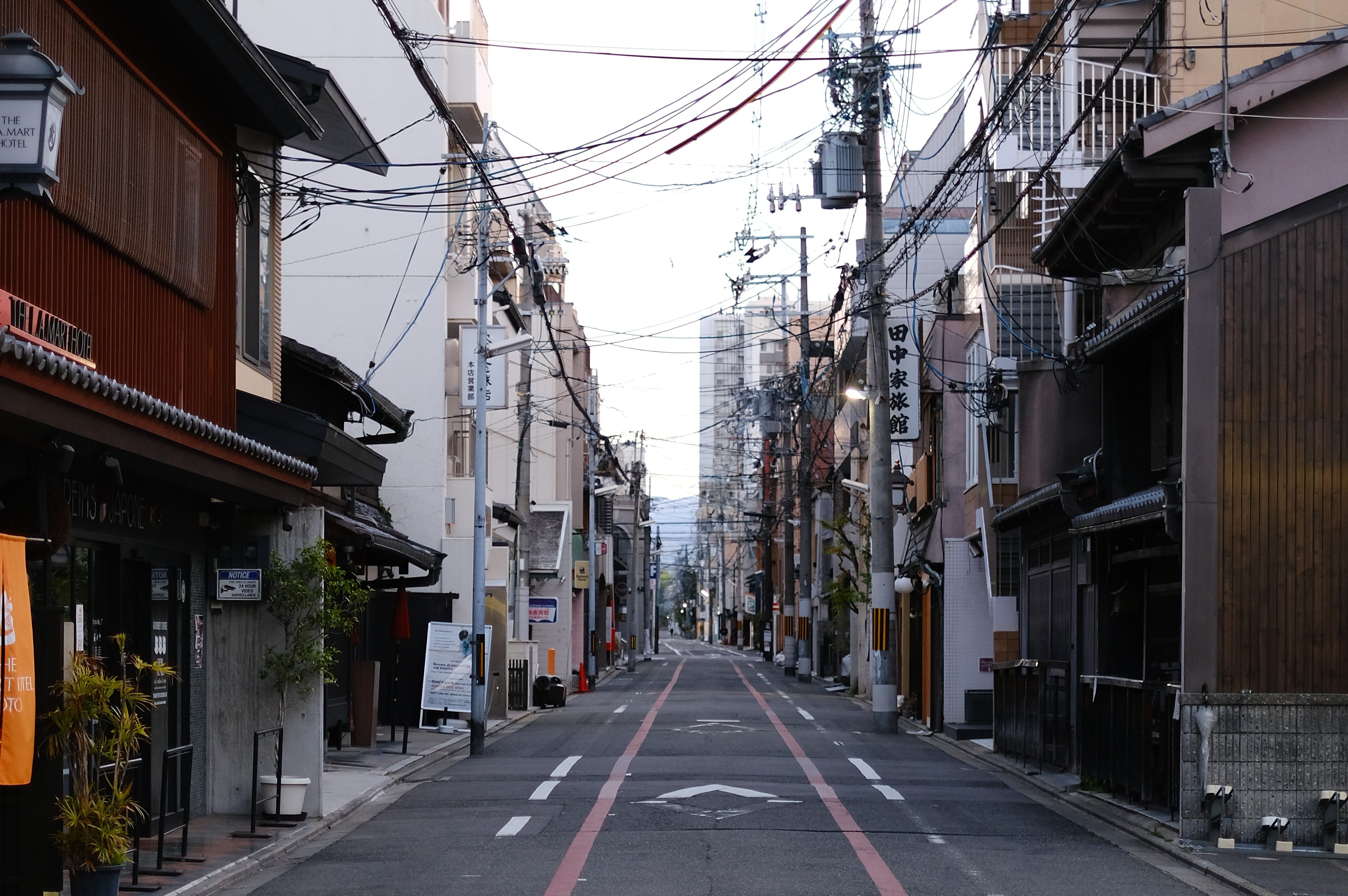 Serene view of a traditional street in Kyoto, Japan, showcasing authentic architecture and ambiance