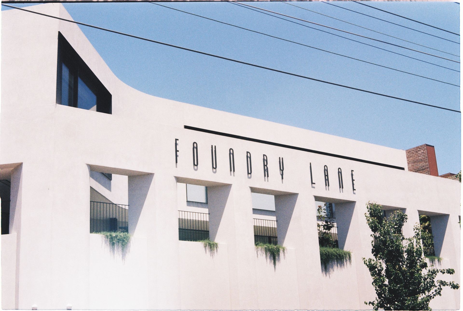 Stylish facade of the Foundry Lane building in Melbourne, Australia showcasing modern architectural design.