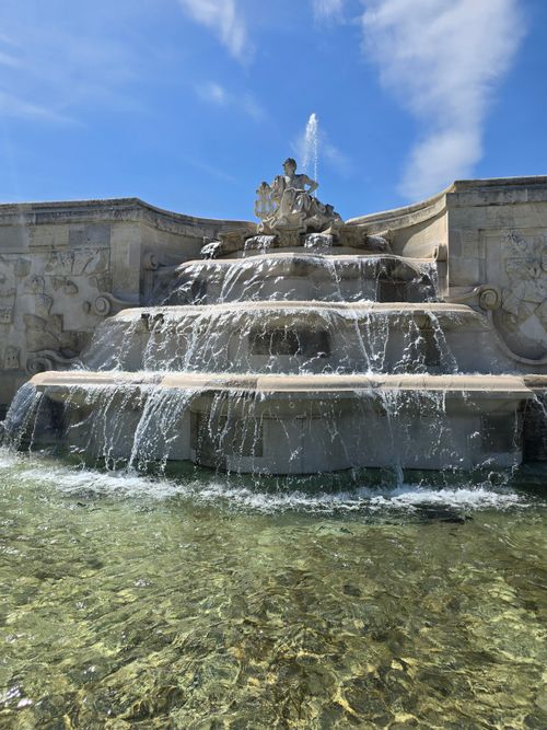 Free Beautiful fountain at Schloßhof, Austria showcasing cascading water under a clear blue sky. Stock Photo