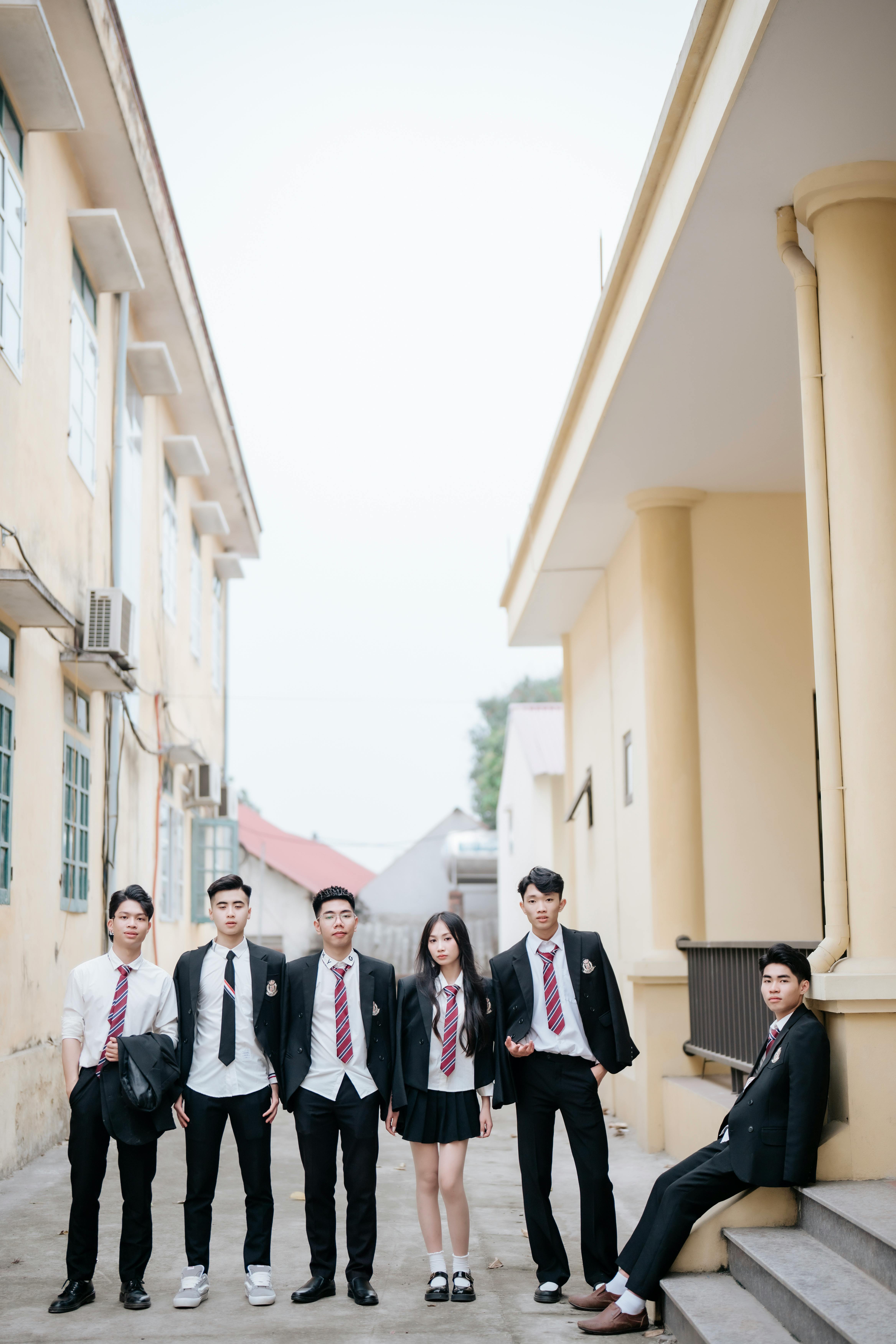 Group of Students Posing in School Uniforms Outdoors