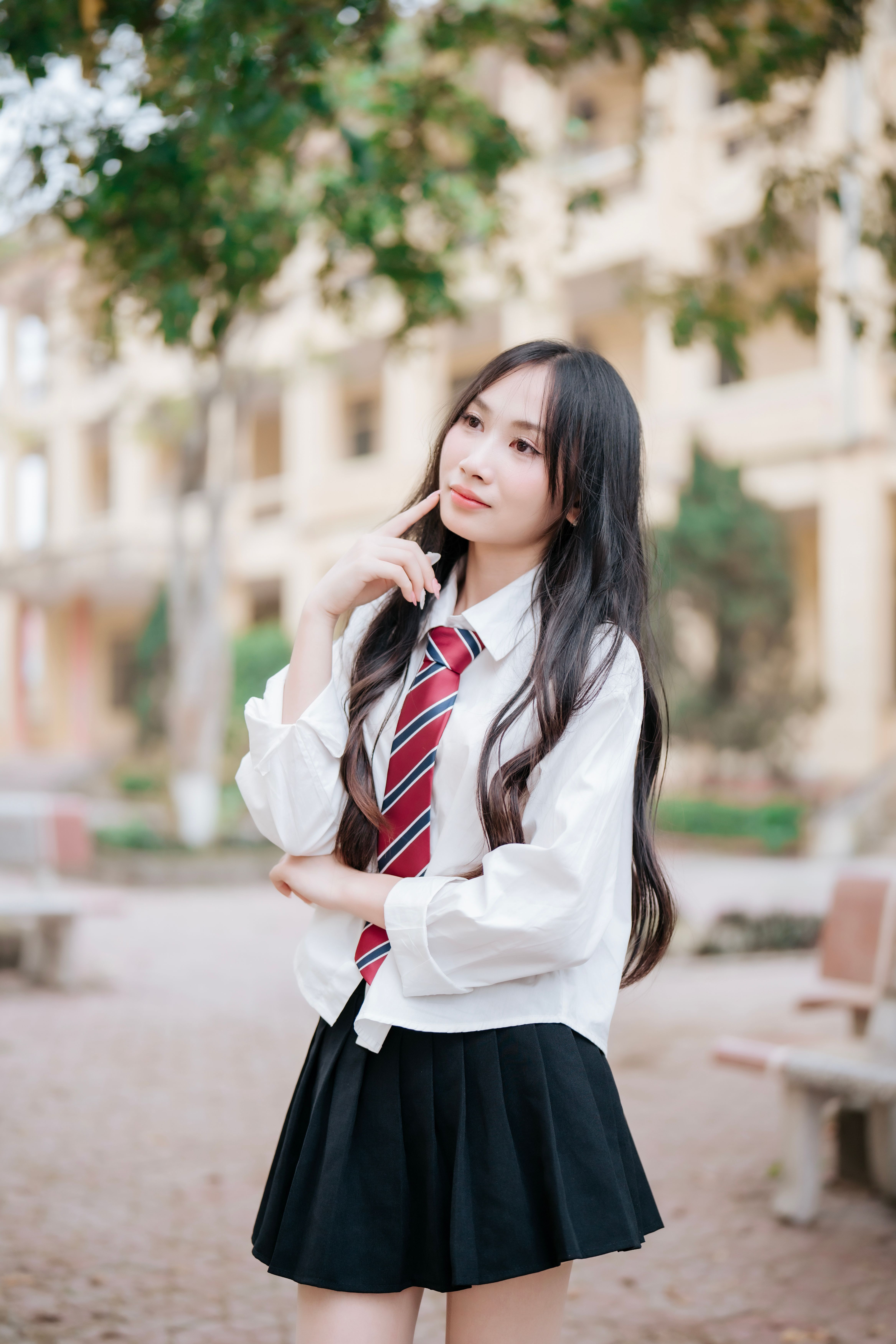 Young Woman in School Uniform Outdoors · Free Stock Photo
