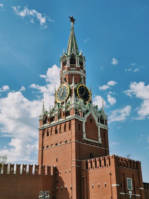 Free The Spasskaya Tower of the Moscow Kremlin under a clear blue sky. Stock Photo