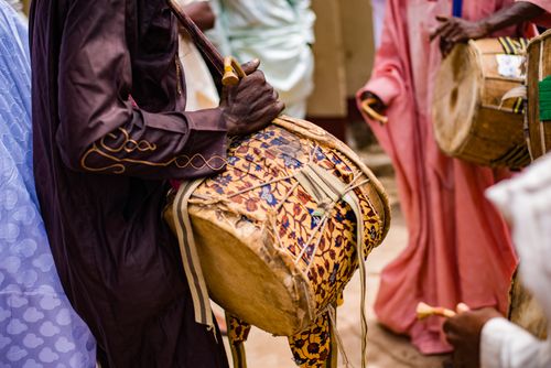 Free Vibrant scene of African drummers performing at a festival, showcasing cultural heritage. Stock Photo