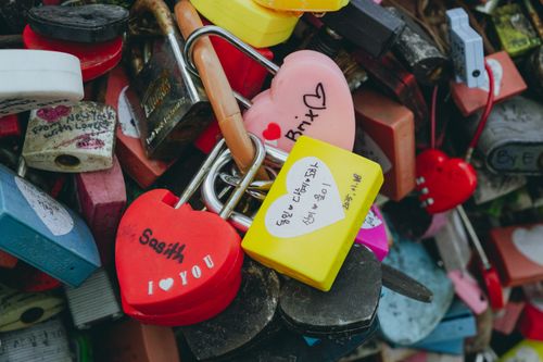 Free Vibrant heart-shaped love locks at Namsan Seoul Tower symbolize eternal love and tourist attraction. Stock Photo