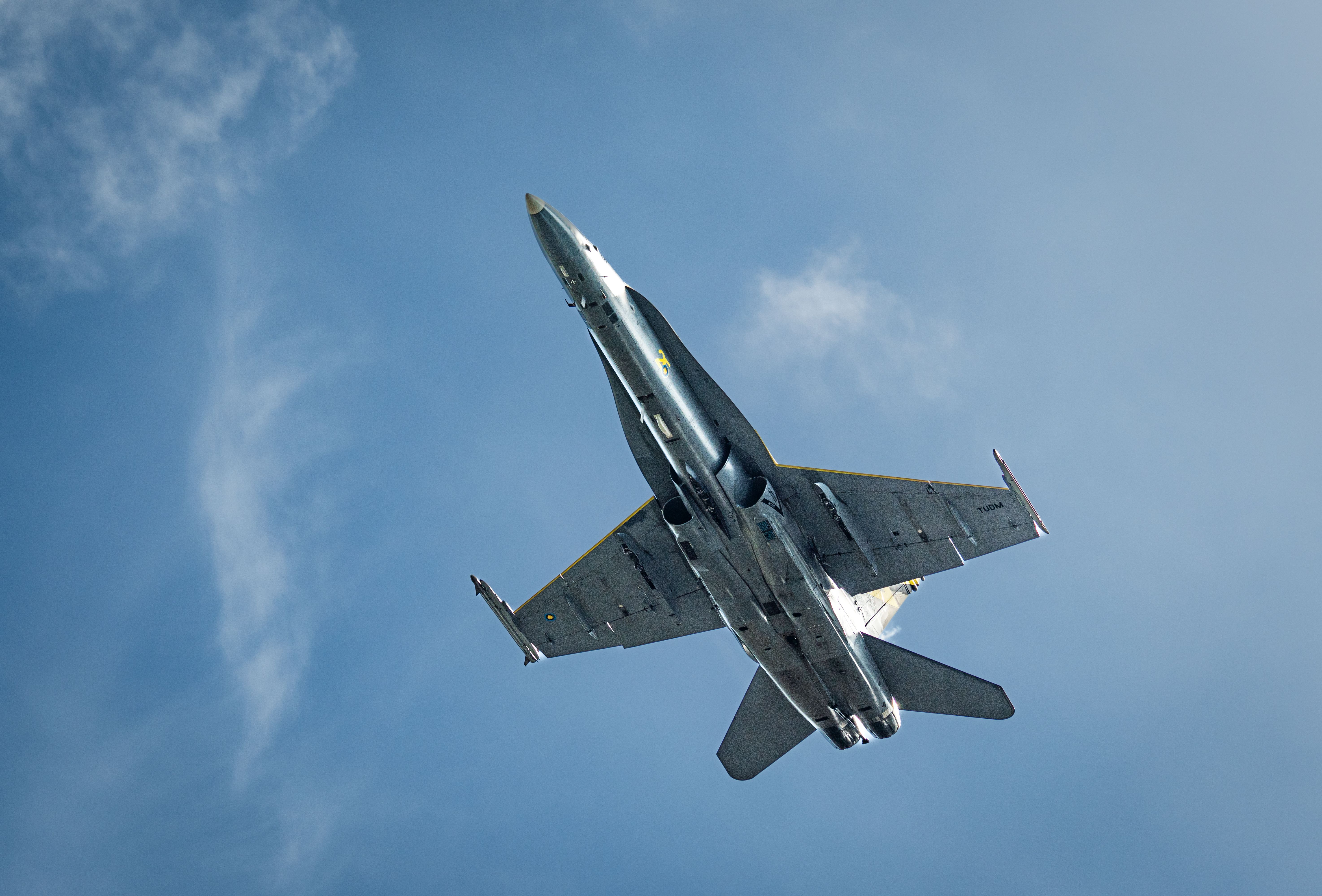 Upward View of Military Jet in Clear Sky · Free Stock Photo