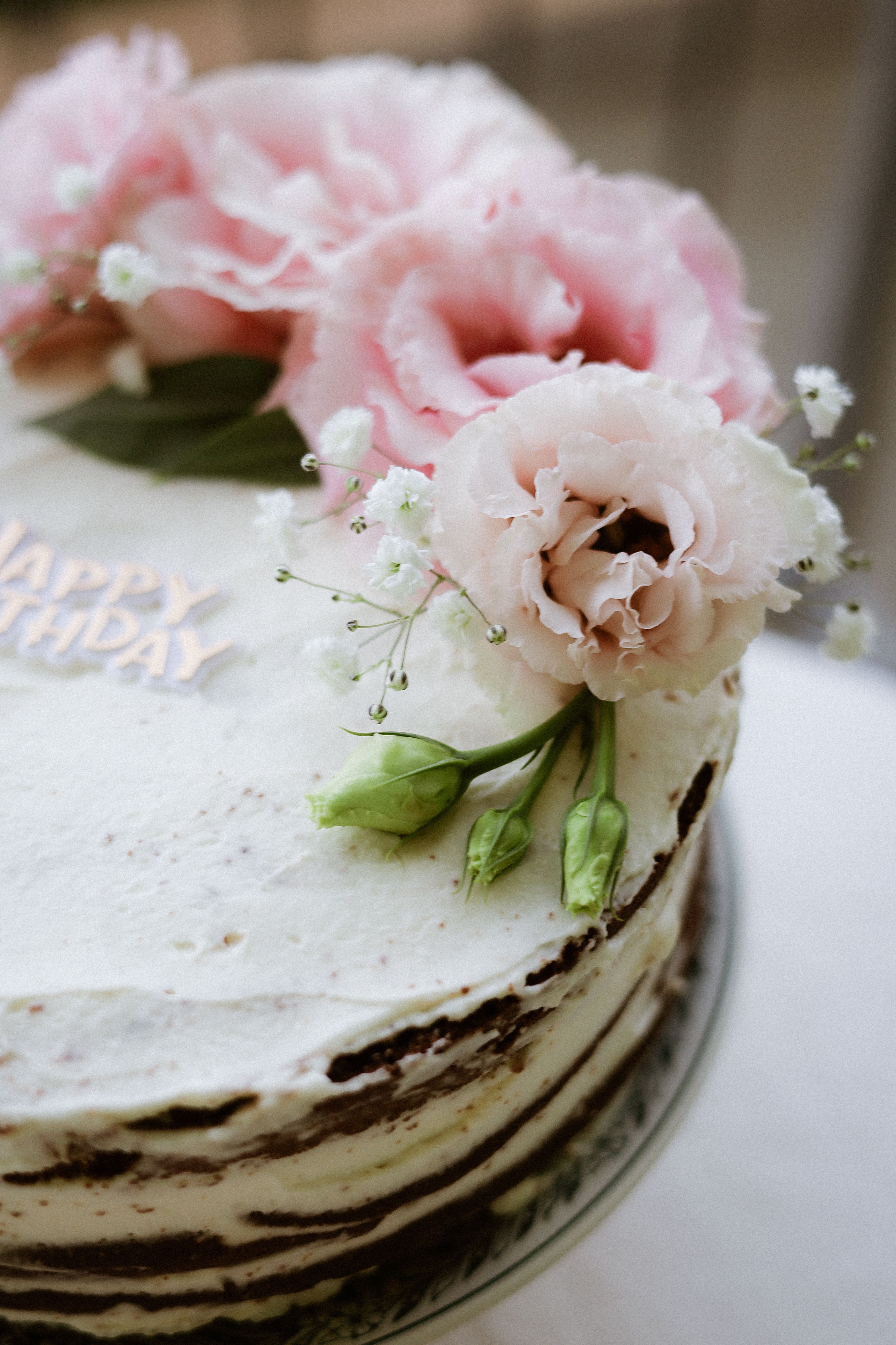 Elegant Birthday Cake with Pink Flowers · Free Stock Photo